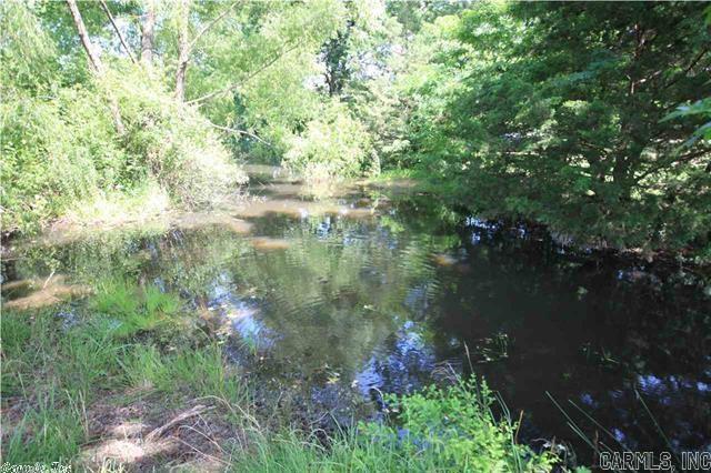 Hurry this wont last long. This beautiful land includes a Barn with stalls for your livestock, shop, creek fed ponds, pasture for your hay.  This would make a Beautiful home site where you could build your dream home or easily put a mobile home on the property or just use it to keep your horses and cows on.