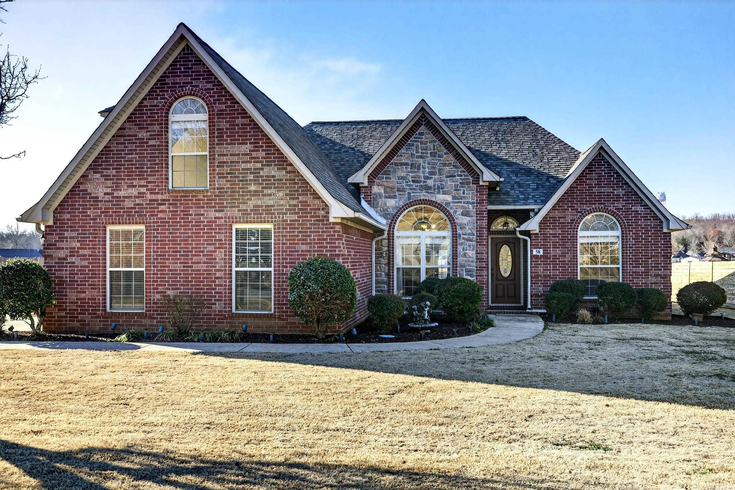 58 Lakeland Drive is the perfect blend of elegance and everyday comfort, nestled in a quiet, walkable neighborhood.  Enjoy true outdoor living with your own private dock on the lake — ideal for peaceful mornings, afternoon fishing, or sunset views. Inside, the home showcases gorgeous barrel ceilings and refined architectural details that add warmth and character throughout. The spacious back porch is designed for entertaining guests or simply relaxing with your morning coffee while soaking in the sunshine. Whether you’re an empty nester looking for serenity or need space for a growing household, this home offers flexibility, charm, and timeless beauty. With a new roof in 2024, new water heater 2025, new privacy fence in 2024 and garbage disposal in 2025, you can know what you are getting.  58 Lakeland Drive isn’t just a house — it’s your next chapter.