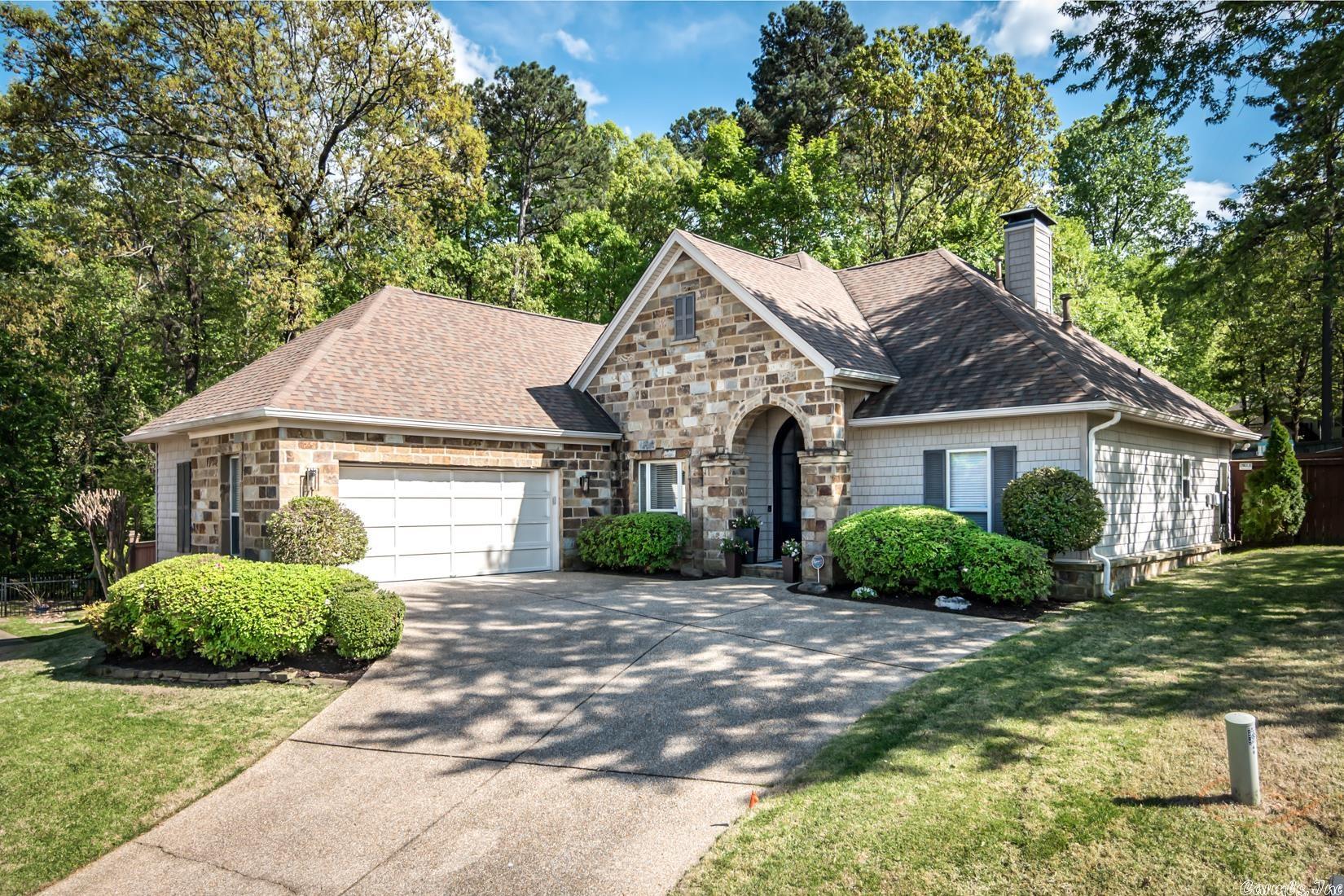 This house is the complete package. Step inside through the brand-new double glass doors and discover a quiet cul-de-sac location framed by beautiful green space. The traditional design features an open floor plan and a split bedroom layout, creating a spacious and inviting living environment. The kitchen has been recently updated with fresh paint, new countertops, cabinets, lighting, and appliances. The primary bedroom boasts a tray ceiling with recessed lighting, while the large upstairs bedroom could serve as a great game or media room. Additional features include a security system, sprinkler system, and full fencing for added peace of mind. With so many updates and amenities, this home is a must-see!