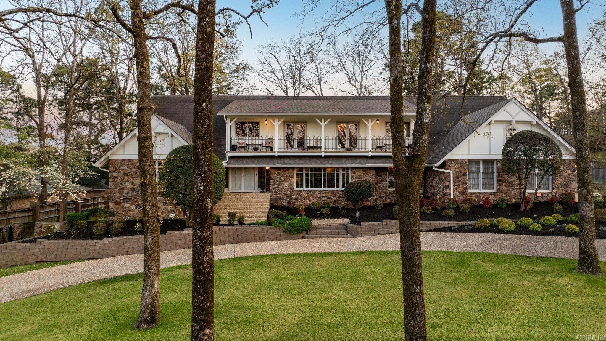 Stunning home overlooking Pleasant Valley Country Club golf course! This beautiful property offers 5 bedrooms and 4.5 bathrooms, along with multiple living spaces, perfect for everyday living and entertaining.  Enjoy a fabulous media room downstairs (full bath across the hall) and a spacious main level living area with wet bar all near the kitchen.  Formal dining and living rooms as well.  The primary bedroom is on the main level with a gorgeous, updated bathroom and enormous walk-in closet! The kitchen has abundant storage and room for a breakfast table as well as a breakfast bar.  Large laundry area as you come in from the 3 garage as well as a back staircase.  Upstairs is an additional living room that opens to a balcony with incredible golf course views. Four generously sized bedrooms, an exercise room and tremendous storage make up the upstairs.   A wonderful home for hosting and making memories!  Home also has a a generator.