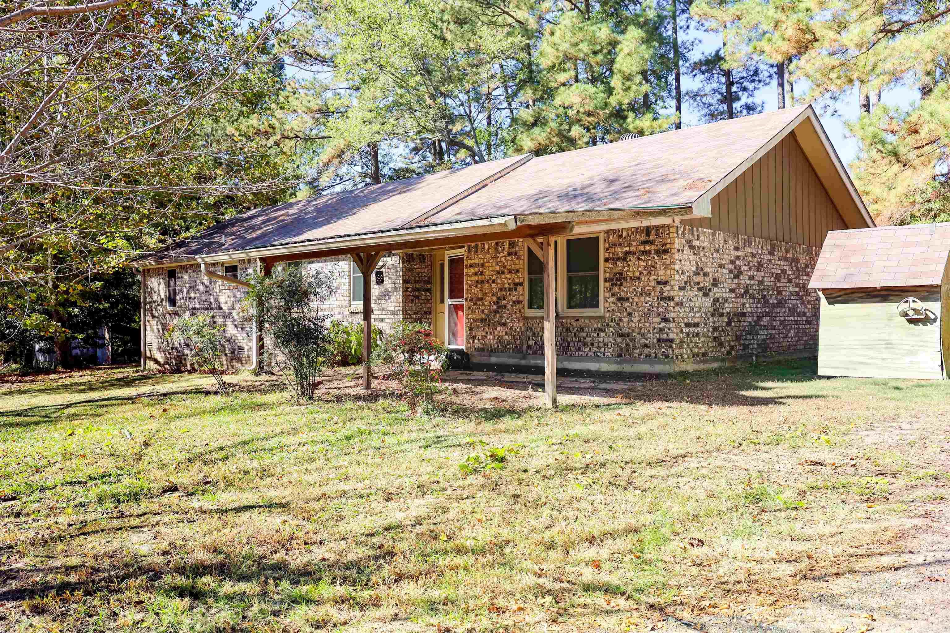 Charming 3-bedroom, 1-bath brick home located just outside the city limits. This property features a convenient outdoor storage area and comfortable living with four mini-split heating and cooling units, including two exterior units. Perfect for those looking for easy upkeep and functional living space. This property features new windows, lots of updates, and is only 2 miles from Lake Greeson access!
