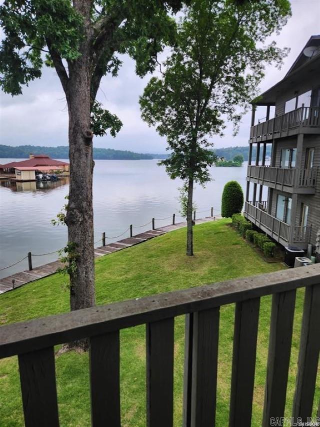 What a view!! Two same level condos sold together with the ability to renovate into single dwelling. Located directly on Lake Hamilton, Boat Slip included!!!!!!   Closed Piers foundation  Fiberglass Shingles POA Dues include a termite contract
