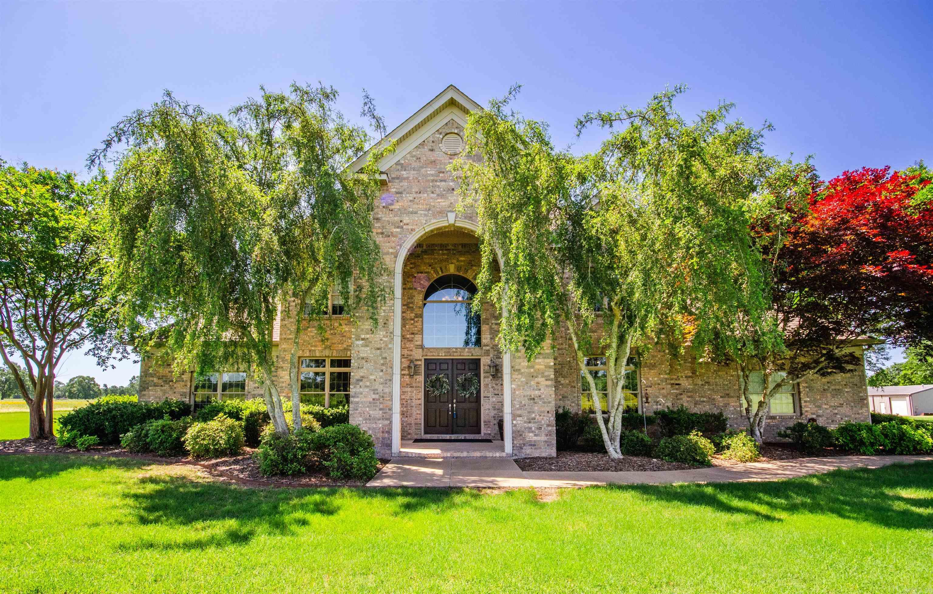 This private custom estate is unlike anything else! No property like it with this much land & privacy! Truly a little piece of heaven in the city limits, easy access to, Lewis Ranch, Conway Commons, I-40. Perfect Location! Full of all the extras on 25 ac. custom built cabinetry throughout the entire home, Pella windows w encased blinds, 2 living areas 1 w a beautiful wood ceiling, 2 wet bars, wood burning gas fireplace w 200 yr old mantle, gas logs present, home office, large dining area big enough for 12 person table, real hardwood floors, all bedrooms w custom built-ins including tv cabinets, desks & walk-in closets, real stairs to the heated & cooled attic, multiple storage closets just off kitchen 1 w outlets for 2 fridges, massive walk in pantry w storage, 3 car garage w oversized storage room, safe room w bench seating, hot & cold water, central vac & plumbed for a pool directly off back of the beautiful covered porch.2 bay shop w kitchen, toilet, closet & overhang, Home is heat electric or propane switch/owns the tank, long private driveway resealed, sprinkler system for landscaped areas & brand new roof late 2023. Car vacuum IMMACULATELY clean & on Conway Corp.See Agent R