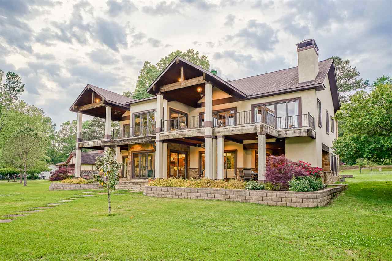 LAKE HAMILTON...519 KIRSCHWOOD...Family Retreat...(3) Master suites-PLUS (4) Bed Bunk Room...(3) Fireplaces...(2) Living Areas w/fireplaces...Wet Bar...Cozy outdoor kitchen w/Fireplace overlooking the lake...High end finishes throughout...Double Boat Dock plus swim dock and wave-runner floats...Great Area...SEE AGENT REMARKS