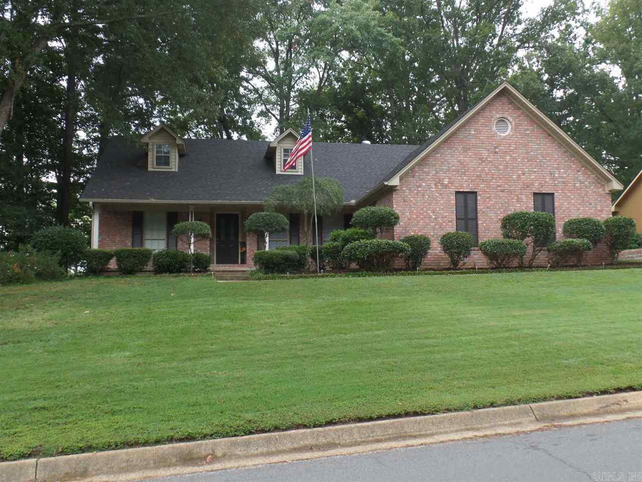 Quality Custom Home with great floor plan for a family, a couple or a single.  Beautifully decorated with many updates.  The very special extra feature is the spacious private porch on the back overlooking woods and the beautifully manicured lawn... Detached, almost hidden carport built for boat storage but also works great for an extra vehicle.  Lots of concrete driveway. This one has had lots of TLC and is a unique treasure.  The lovely Master Suite is right off the kitchen, separate from Guest bedrooms.