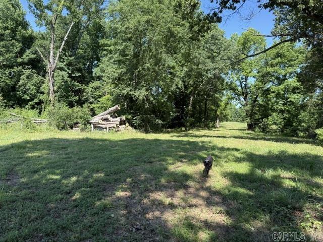 RARE & BEAUTIFUL 98 ACRE RANCH ON THE EAST FORK OF HORSEHEAD CREEK WITH A LITTLE BIT OF EVERYTHING ON IT! OVER 6/.10THS OF A MILE OF CREEK FRONTAGE IN A SECLUDED VALLEY. LARGE TRACTS ALL AROUND IT! MULTIPLE SWIMMING/FISHING HOLES, ABUNDANT DEER & WILD TURKEYS, MARKETABLE BUILDING STONE, LARGE TREES. MAN-MADE CAVES THAT WERE OLD COAL MINES IN THE 1800'S THROUGH THE 1920'S. CREEK BOTTOM PASTURE THAT WAS A HAY MEADOW. MULTIPLE HILLTOP BUILDING LOCATIONS WITH VIEWS. 3 ACRE STOCKED PRIVATE LAKE/POND. SIDE-BY SIDE TRAILS DOZED IN IN SEVERAL LOCATIONS. SOME PINE TIMBER EAST OF CREEK. ONE OF A KIND OPPORTUNITY!