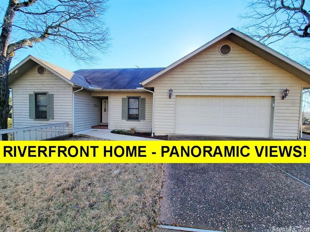 RIVERVIEW HOME W/INCREDIBLE VIEWS of Golf Course & South Fork River. 3 bdrms, approx 1867 sq.ft., 2 ba, 2-car garage, workshop under house. Living rm w/great views, open kitchen, stainless steel refrig, range, granite counter tops, dishwasher & eat-in breakfast area. Living rm & kitchen share hardwood flooring. Large dining rm! Master bdrm w/walk-in closet! Master bath offers jetted tub & walk-in shower.   $1,321.50 property tax does not include special improvement tax, call SID for amount, 870-257-2468.