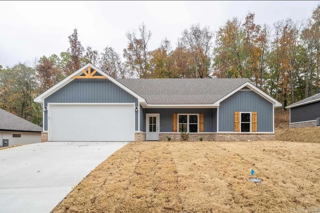 Welcome to 117 Stonebriar Drive in Hot Springs, AR — a super cute single-family home offering 3 bedrooms and 2 full bathrooms. The residence is located within a gated community and includes a microwave in the kitchen for added convenience. Thoughtfully maintained, this property blends comfortable living spaces with the added security of gated access. Conveniently positioned for access to local amenities and attractions in Hot Springs, 117 Stonebriar Drive is ready to welcome its next occupant.