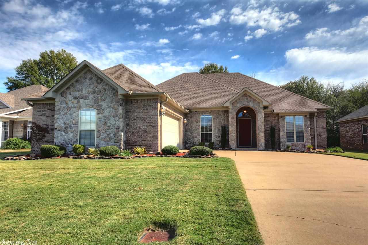 This home is a MUST SEE!! When you step through the arched, rock entryway into the spacious living room, you will be home. The kitchen features stained Alder Wood cabinets with breakfast bar. The option of a formal dining room or office is yours. The Master suite is private and has a large walk-in closet with built-ins. The backyard has a covered patio and a 9 x 28 deck that extends the back of the home. Sprinkler system and fully fenced yard completes your home. See Agent Remarks.