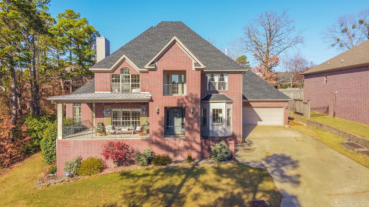 Lovely home w/ soft modern farmhouse touches! Beautiful views throughout this 5 bed/4.5 bath home. Included in the space are a guest suite on the first level, solid surface flooring throughout (no carpet), play room, mudroom, office, Jack & Jill suite, walk-in closets, 2 balconies and a  spacious dining room. Extensive updating to the kitchen including new appliances (gas connection available for stove) & a granite slab to accommodate seating for 6. Too many updates to list! Agents see remarks. Open Sun 2-4