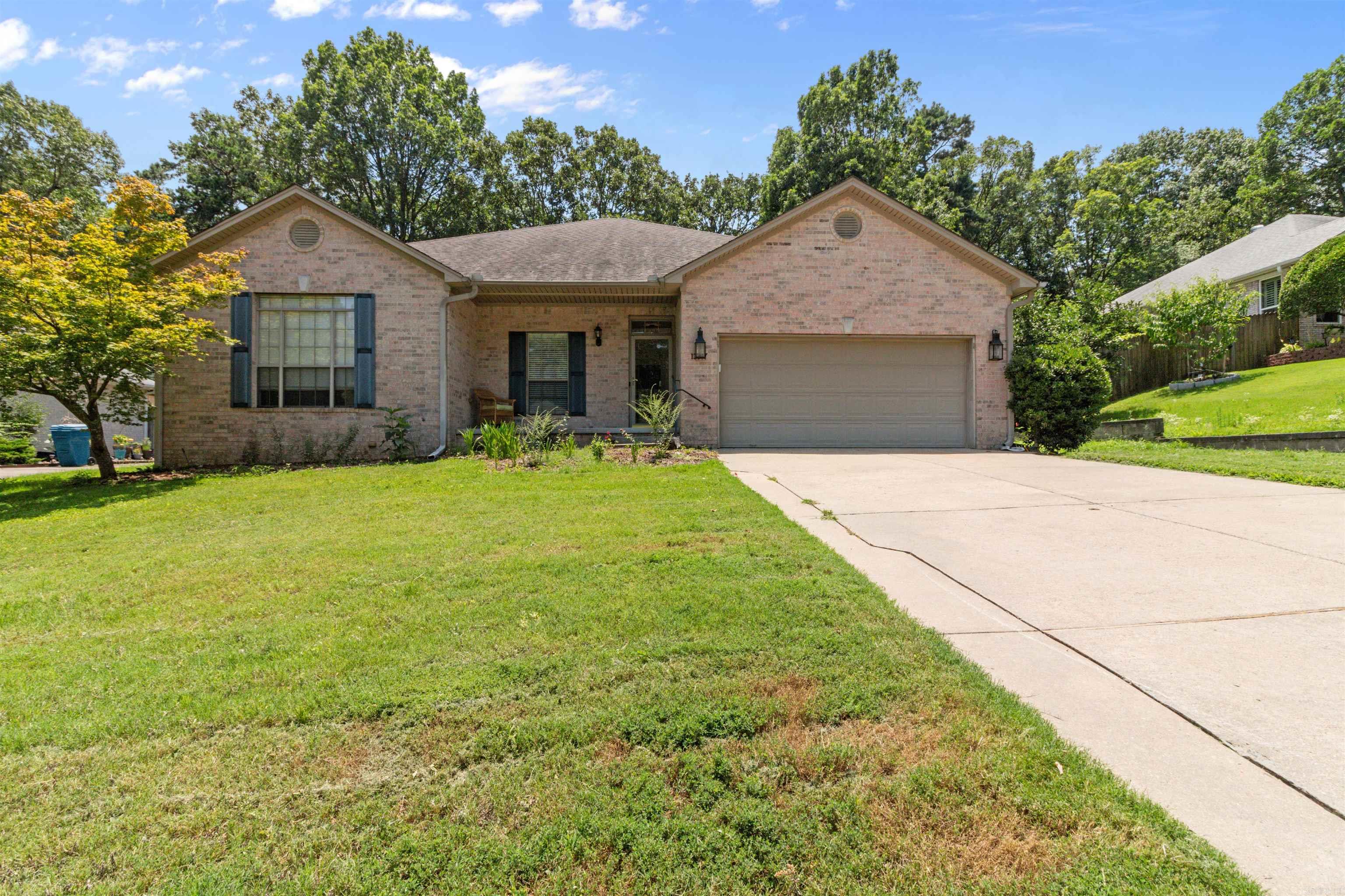 Beautifully updated 3BD/2BA with a 2-car garage in West Little Rock that is ready for you to call home. Fresh paint and carpets throughout! Covered front porch with front and back garden beds full of native plants. Spacious living room with a cozy fireplace that leads to the eat-in-kitchen. Sleek backsplash and granite countertops. Bay windows that let in tons of natural light. Separate dining area perfect for entertaining family or friends. Plenty of space in bedrooms. Updated bathrooms with modern fixtures. Back screened porch that is perfect for enjoying beautiful Arkansas' days in the shade. Fully fenced yard ideal for anyone with kids or pets to run off some energy. New windows throughout to help cut down on energy costs as well as a backup generator in case of a power outage. Carraige Creek park right down the street with a peaceful pond and tennis courts as well as a short drive away from St. Charles neighborhood park and pool! Note that this property will not come furnished but will come equipped with all appliances! This property is managed by Hoffman Team so beware of scammers - we will never ask you to Cashapp us money. Contact our Hoffman Team office today!