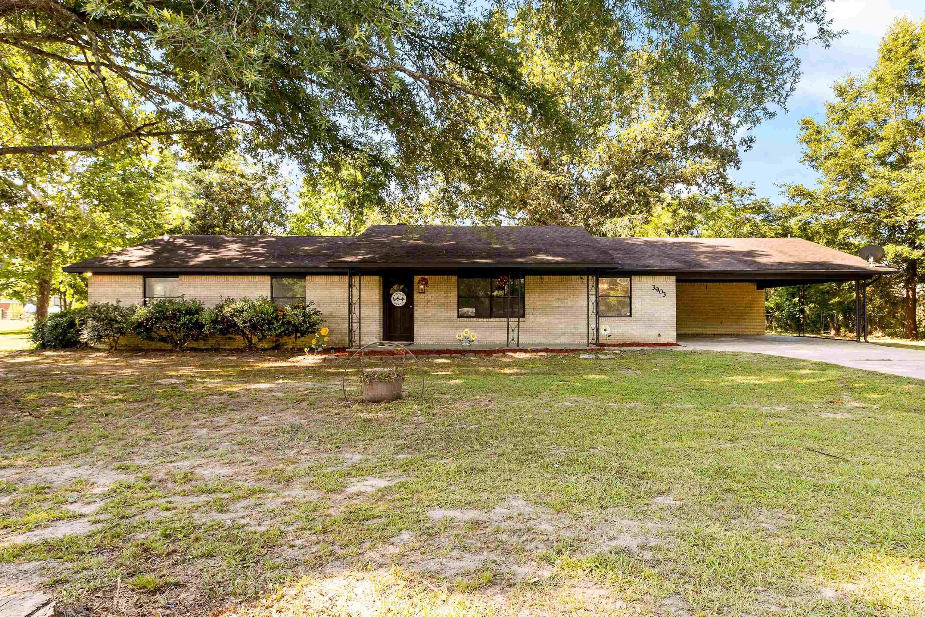 Welcome to this updated 3-bedroom, 2-bath home situated on approximately 1.45 acres, offering the perfect blend of comfort, functionality, and outdoor space. Inside, you'll find fresh paint, updated light fixtures, new flooring throughout, and no carpet for easy maintenance. The spacious layout features two living spaces one with a beautiful brick fireplace, a formal dining room, and a functional floor plan designed for everyday living. A new water heater adds additional peace of mind. Step outside to enjoy the large covered back patio overlooking the fully fenced backyard, plus an additional fenced area at the rear of the property that's ideal for pets, gardening, or extra storage. Two outbuildings provide even more versatility—one includes a covered carport that's perfect for storing lawn equipment, tools, or recreational items, while the second offers excellent potential for a workshop, studio, hobby space, or future guest quarters (buyer to verify intended use). With approximately 2,081 square feet of living space and plenty of room to spread out, this property offers the space and flexibility you've been looking for, all while being just minutes from Little Rock conveniences!