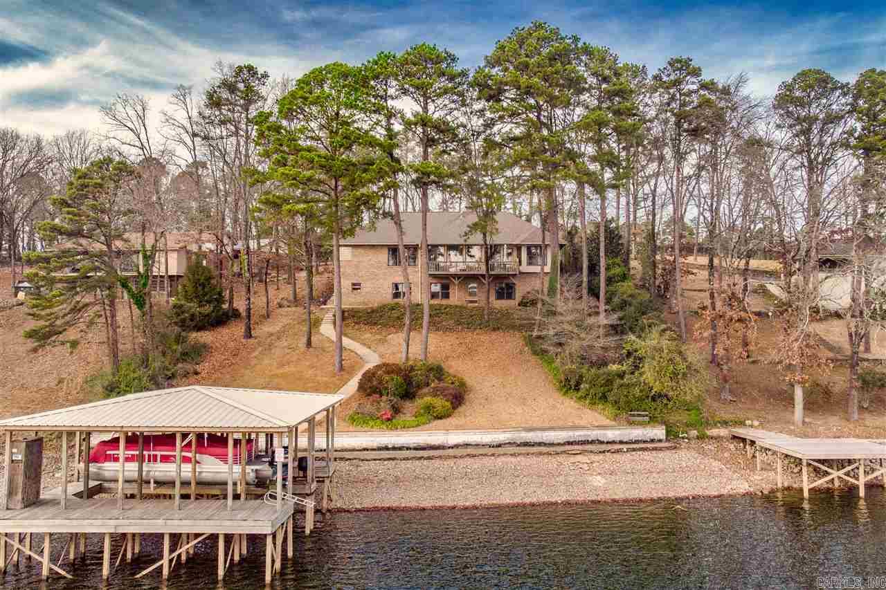 Welcome to this beautiful lakeside home on prestigious Long Island.  All surfaces have been touched in the last 3 years including paint, tile, flooring, 2 new HVAC systems, new stove, fridge, wall oven/micro combo as well as a brand new double boat dock and sea doo dock with remote control hoists!  Make your showing appointment today to view this outstanding lake estate.