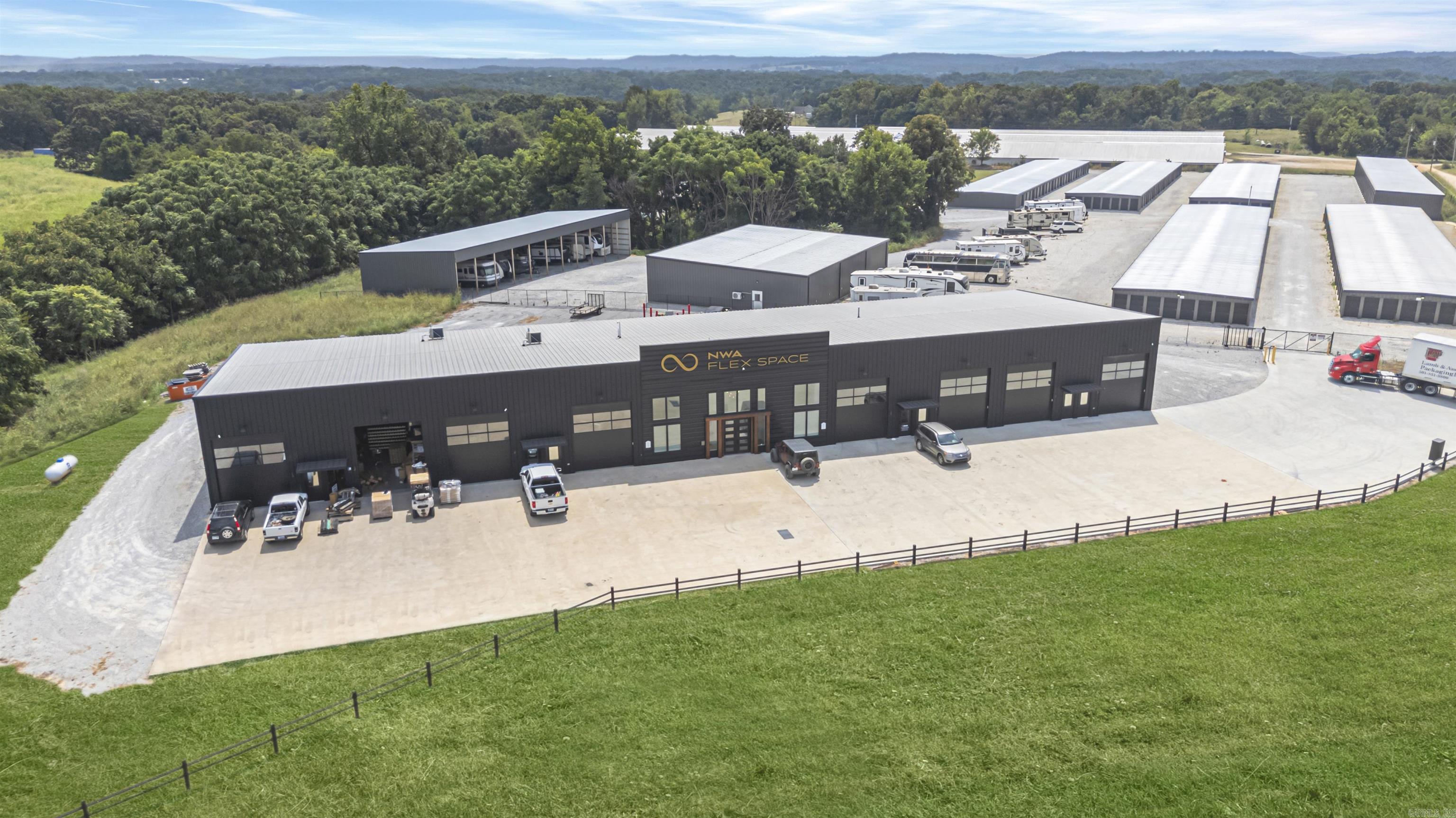A multi tenant NNN flex space center in east Springdale, Arkansas is available for acquisition. The property totals 11,998 square feet and is currently 79% leased, with one 2,400 SF suite available for lease up. All tenants operate under NNN leases with minimal landlord responsibilities. The current rent is $127,728 with 10 tenants but there is a potential rent of $159,408, if the vacant unit is filled at their listed rates. The adjusted NOI is $150,653, when considering the vacant unit. The site spans 3.48 acres and sits along Highway 412 with approximately 19,000 vehicles per day.
