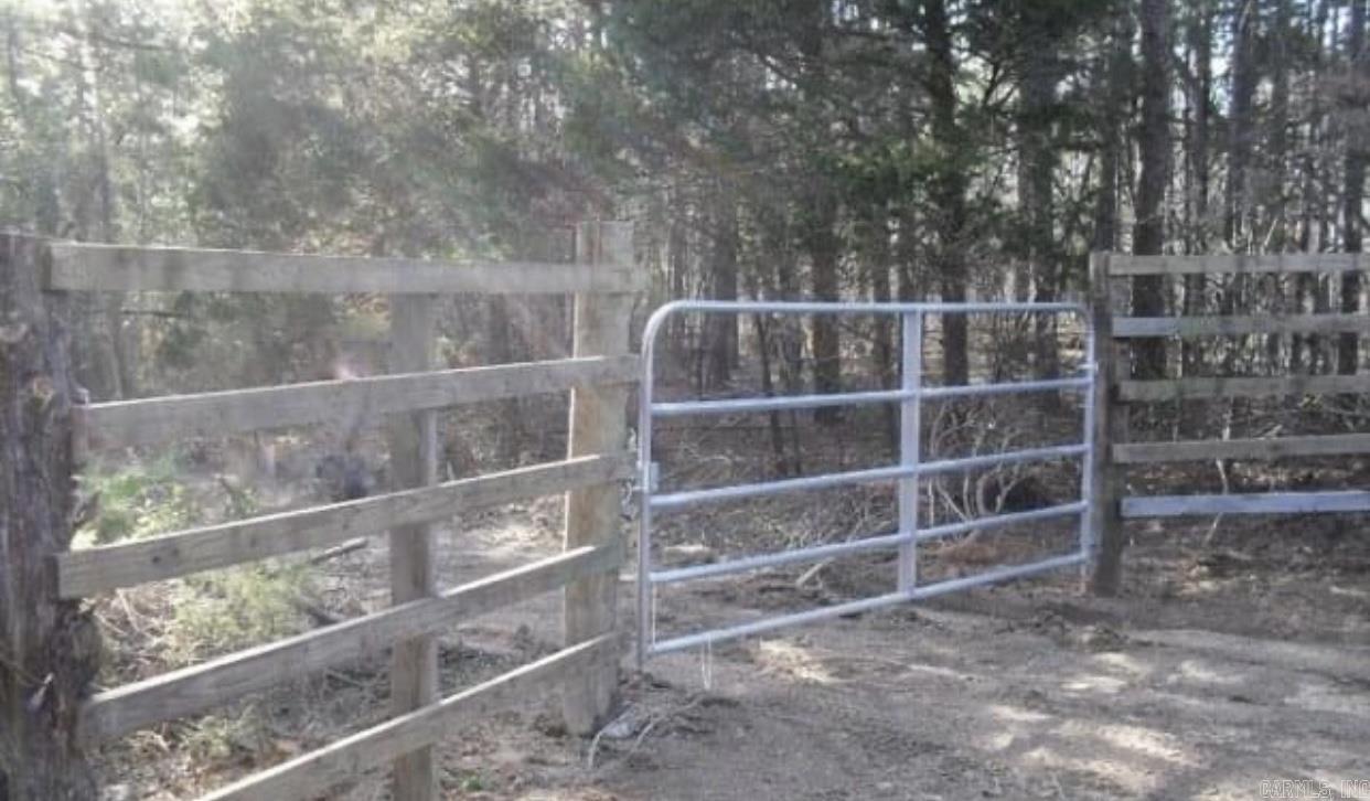 Great piece of property for hunting or hunting club.  Lots of places to build that perfect cabin.  Quiet and peaceful.  The electricity is available and is near the acreage line.  There have been signs of deer, bears and wild hogs.  Level on top.  Slopes down to two creeks.  The water runs underneath one at one point.  The seller has never seen one of the creeks dry.  Has some pools of water. Some giant boulders along the creek at some points.  The timber on the west size is  really big and on the east side mixed timber.  See remarks.
