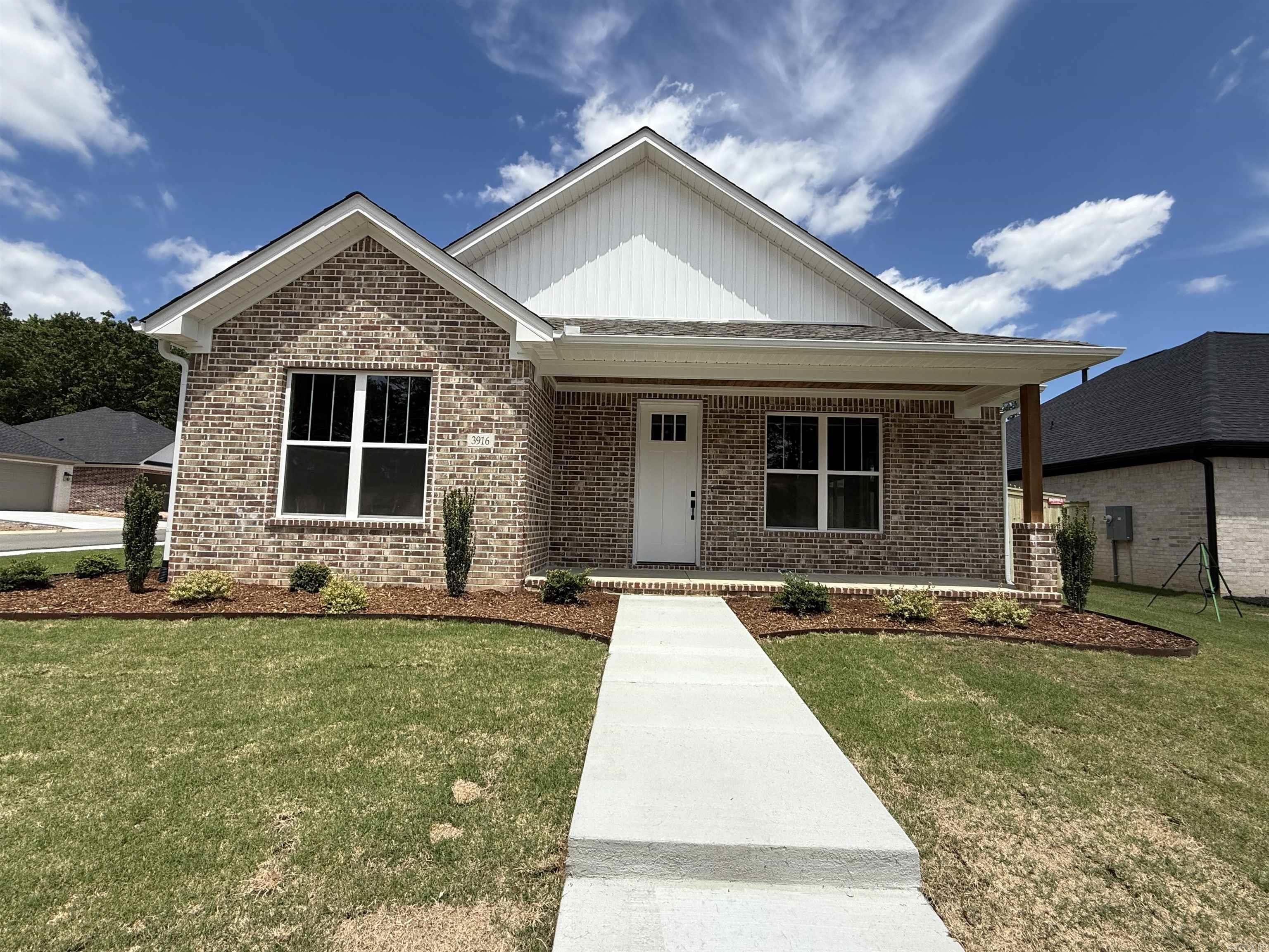 Welcome to your dream home in Benton’s premier subdivision, Spencer Crossing! This stunning brand new construction boasts a spacious split floor plan designed for modern living. Step into the heart of the home where custom-built, soft-close floor-to-ceiling cabinets adorn the kitchen, complemented by a freestanding stove & a convenient pantry for all your culinary needs. Cozy up by the brick gas fireplace in the open living area, perfect for entertaining or relaxing evenings at home. Retreat to the private primary suite featuring a luxurious primary bath complete with double vanities, and a large walk-in tile shower, offering a spa-like oasis right at home. The split floor plan ensures privacy with spacious spare bedrooms, providing ample space for family or guests. Step outside onto the covered porch & immerse yourself in the tranquility of the backyard, where you’ll love spending time in the expansive outdoor living space. Whether it’s morning coffee or evening gatherings, this home offers the perfect setting for enjoying the outdoors. Don’t miss out on the opportunity to make this beautiful home yours!