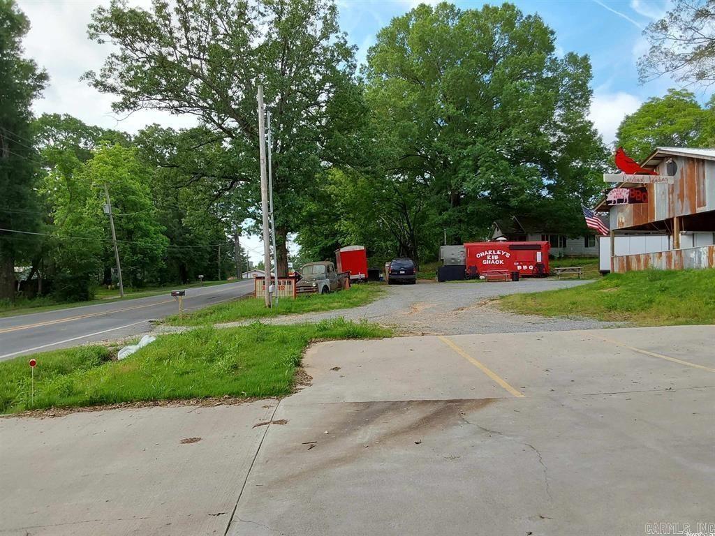 Commercial property in the heart of Haskell.  Currently is a food truck court. Has all public utilities with 6 storage units and a public bath for customers.  Pavilion for events and is in a great location.