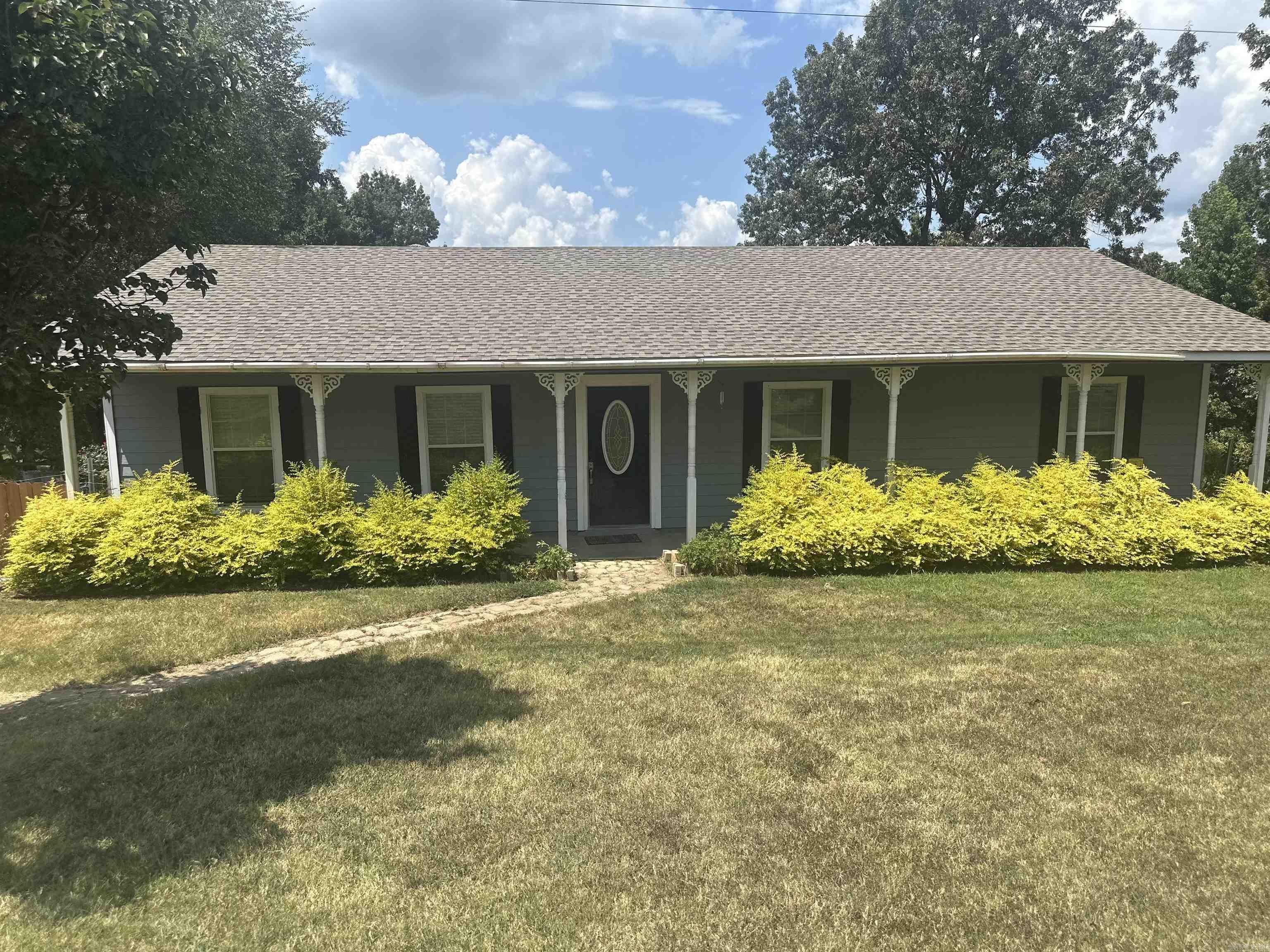 Escape to the country without sacrificing convenience on this beautiful 12± acre property just outside Paragould! This turnkey rural retreat offers the perfect blend of comfort and functionality—ideal for livestock owners, hobby farmers, outdoor enthusiasts, or anyone craving peaceful country living. The 1,500± sq ft home features 3 bedrooms, 2 bathrooms, a functional layout, and a brand-new roof. Whether you’re looking for a private homestead or move-in-ready escape, this home offers comfortable living with gorgeous countryside views. Enjoy a half-acre stocked pond perfect for fishing, relaxing evenings, and wildlife watching. The rolling pasture is almost fully enclosed by over 4,400 linear feet of premium imported Tornado Wire 13/48/12 fencing from Ireland, designed for superior durability and livestock control, with custom-welded corners and heavy-duty bracing. A spacious 30x40 shop provides endless possibilities for equipment, hobbies, vehicles, storage, or farm use. With open acreage, privacy, and stunning views, this property is ready for your dream lifestyle.