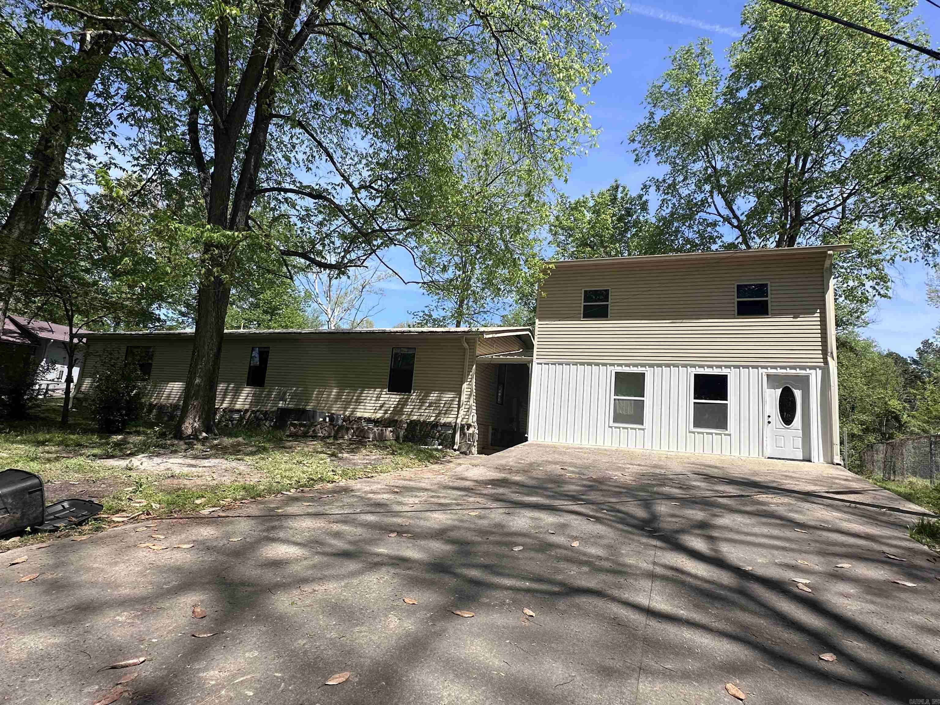 Escape to the peaceful beauty of the Little Red River with this affordable RVERFRONT property—perfect as a weekend getaway or a fantastic investment opportunity for rental income. Tucked away on a quiet dead-end road, this property offers privacy, relaxation, and direct access to some of the best fishing and outdoor recreation in the area. The main home features a spacious layout with a large living area ideal for gathering with family and friends, along with 4 comfortable bedrooms and 2 full baths. In addition, a newly built apartment provides even more flexibility, offering 2 bedrooms, a living area, and a full kitchen—perfect for guests, extended family, or additional rental income. Step outside and enjoy your private boat dock, making it easy to spend your days on the water. Whether you’re looking to unwind for the weekend, entertain, or maximize your investment with short-term rentals, this property checks all the boxes.