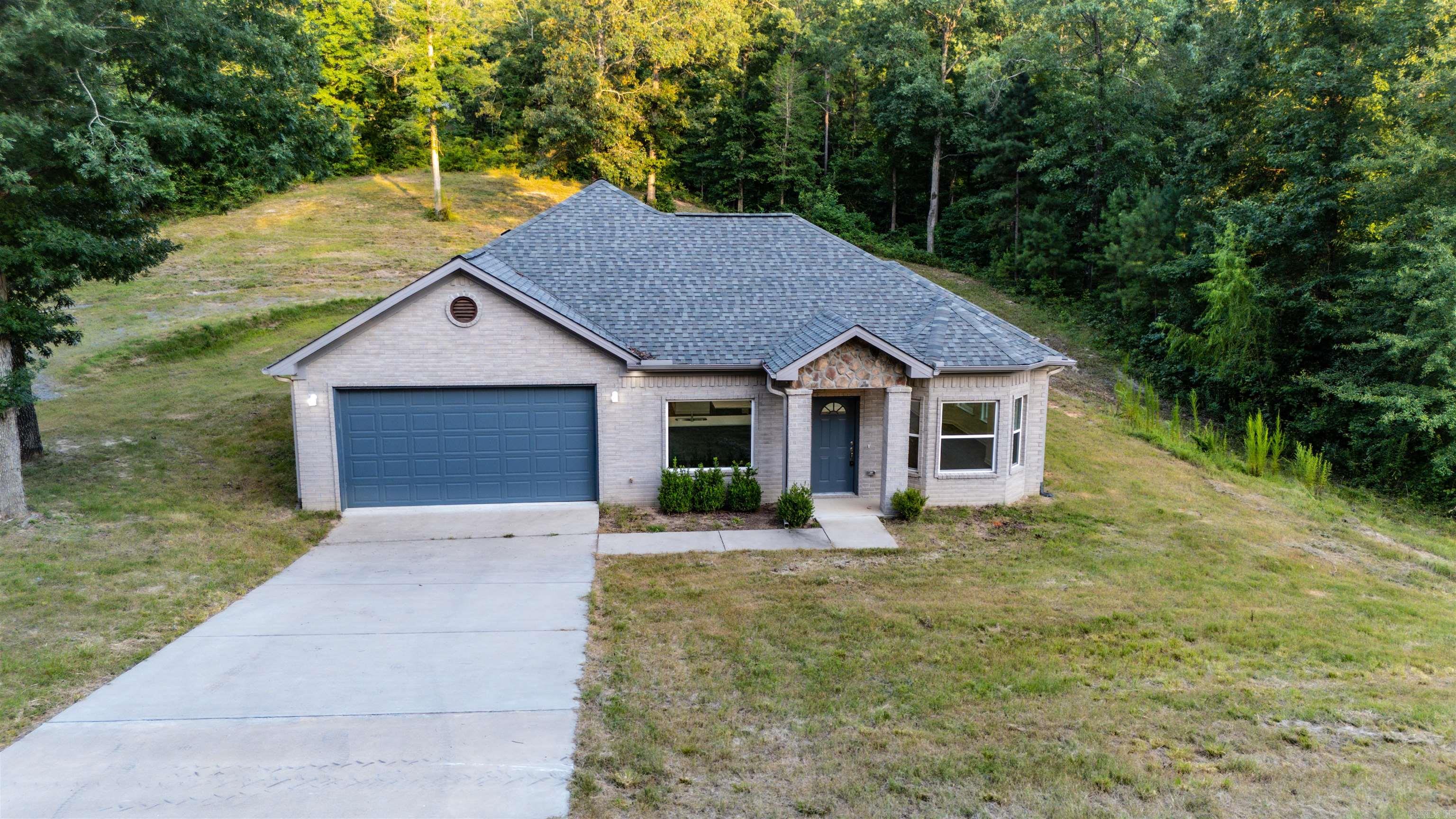 Welcome to 9017 Mariposa Cove in Mabelvale! Built in 2023, this beautiful 3-bedroom, 2-bath home offers approximately 2,343 square feet of modern living space situated on a spacious 1-acre lot. Enjoy the comfort and convenience of a newer home featuring newer appliances and plenty of room both inside and out. The generous lot provides space to relax, entertain, garden, or simply enjoy a little extra privacy. Conveniently located less than 15 minutes from I-30, this home offers easy access to Little Rock, Bryant, Benton, shopping, dining, and entertainment. Spend your free time exploring nearby parks, enjoying family fun at Big Rock Mini Golf & Fun Park, visiting the Outlets of Little Rock, or taking in the exhibits at the Little Rock Zoo—all while coming home to the space and peaceful setting of your own acre. If you're looking for a newer home with room to spread out while still being conveniently located near everyday amenities, 9017 Mariposa Cove is one you won't want to miss. Schedule your private showing today!  Some Pictures are Virtually Staged and Edited by AI