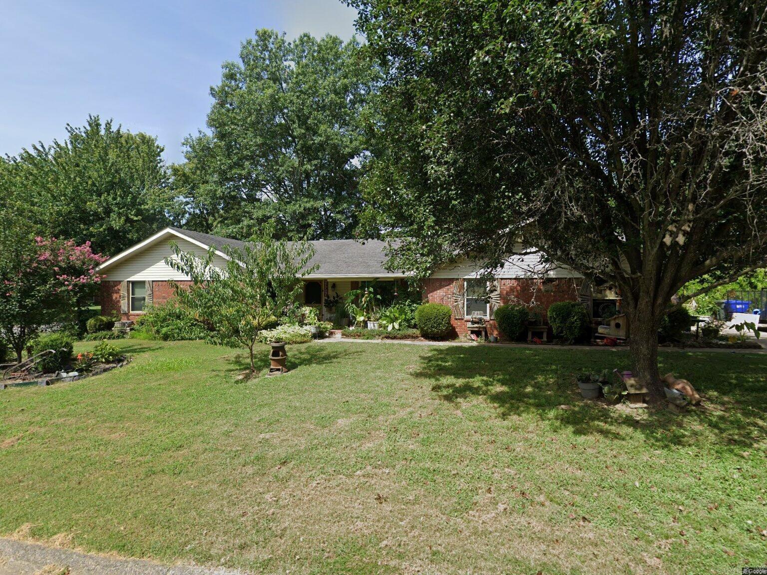 Welcome home to 13 Sedgefield Drive, perfectly situated in one of West Conway’s most desirable, family-friendly subdivisions. Spanning an impressive 2,053 square feet, this classic one-story ranch blends timeless curb appeal with an expansive, functional layout perfect for comfortable living and entertaining. Step inside to find beautiful hardwood flooring guiding you through a spacious living area designed for gathering. The home's layout uniquely features 3 full bathrooms, offering rare convenience and privacy for family members and guests alike. The kitchen and dining spaces offer fantastic flow, ready to play host to everything from quick morning routines to holiday dinners. Outside, the classic stone accents elevate the home's exterior character, complemented by a convenient attached garage and a level lot ready for your personal touch. Enjoy the incredible convenience of being minutes away from Conway’s top-rated schools (including Marguerite Vann Elementary and Carl Stuart Middle School), great shopping, dining, and neighborhood walking trails. Don’t miss your chance to put your personal touch on this well-built, classic Conway home! Schedule your tour today.