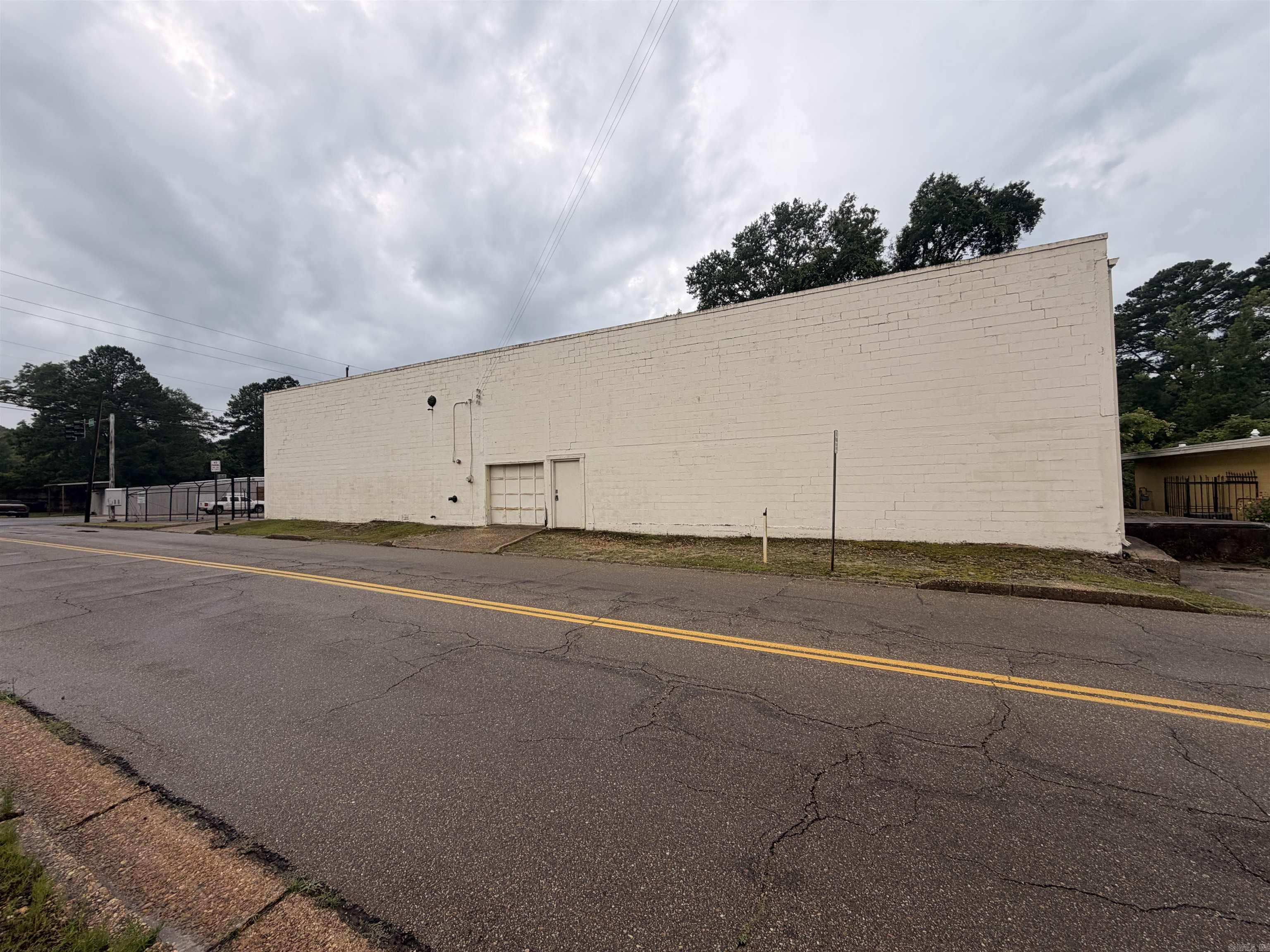 Exceptional industrial warehouse opportunity located at the highly visible corner of E Main Street and Mosby. This spacious 5,000± square foot warehouse offers excellent access and functionality for storage, distribution, light manufacturing, or commercial operations.  Property Features:  5,000± SF warehouse space Prime corner location at E Main & Mosby Two large bay doors for easy loading and unloading Fully fenced outdoor area for secure storage or equipment parking Excellent visibility and accessibility Flexible layout suitable for a variety of industrial and commercial uses Ample space for trucks, trailers, and operational needs  This property combines convenient access, secure outdoor storage, and versatile warehouse space, making it an ideal solution for businesses seeking a centrally located industrial facility.