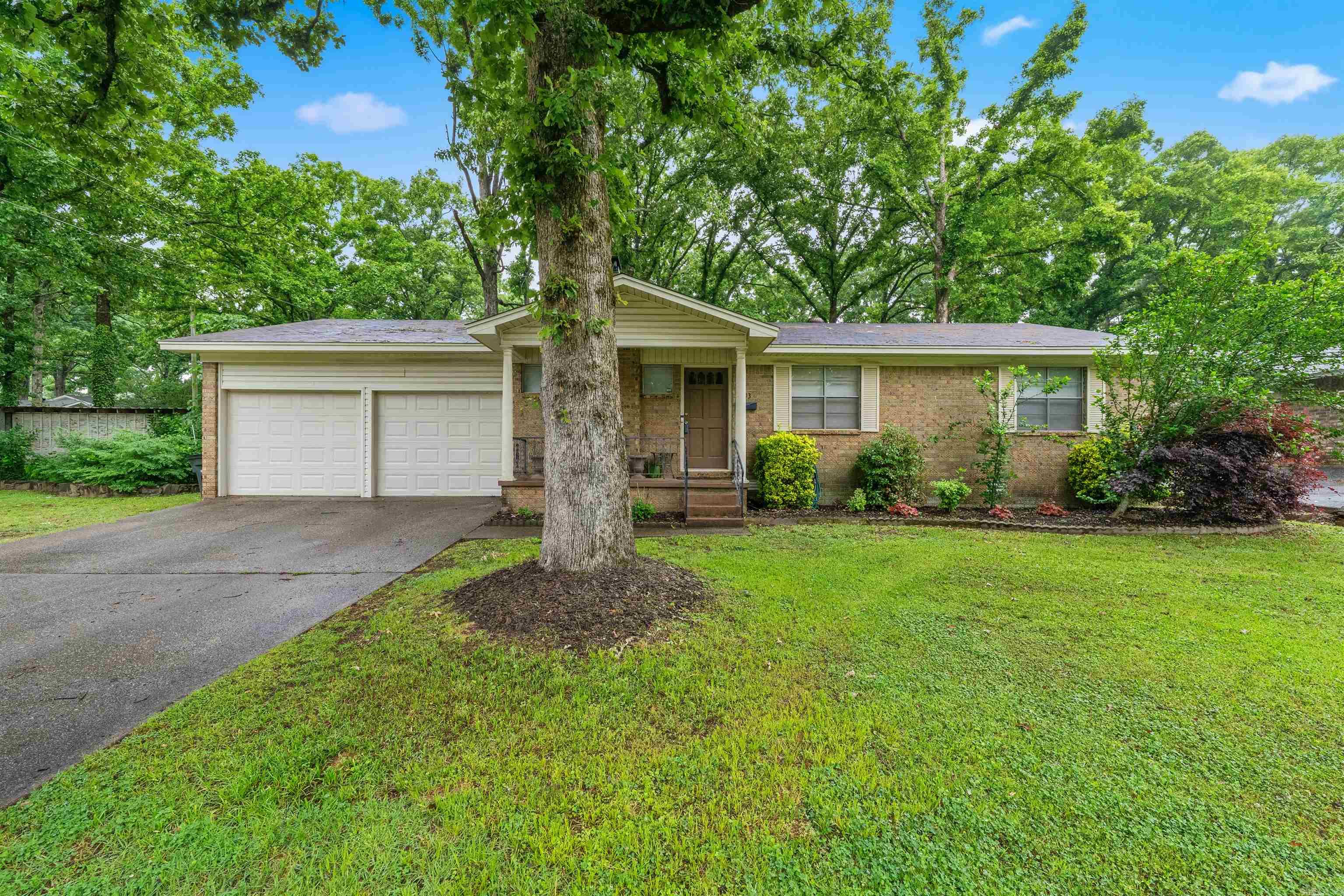 Step into comfort & style w/this thoughtfully updated 3 bedroom, 2 bath home featuring a spacious 2 car garage w/high end finishes. Beautiful LVP flooring flows seamelssly through the home, while a warm gas fireplase creates an inviting focal point in the living. The kitchen is designed to impress, showcasing granite counters, abundant cabinetry, & a layout perfect for both everyday living & entertaining. Retreat to the oversized primary, offering the space and comfort you've been looking for. Enjoy peaceful mornings & relaxing evenings on the screened in porch. The outbuilding has electricity-ideal for a workshop or studio. With major system updates including HVAC and Water Heater (2020), this home offers both beauty and peace of mind. Seller will be putting on a new Roof of Buyer's color choice. YOU DON'T WANT TO MISS THIS ONE!