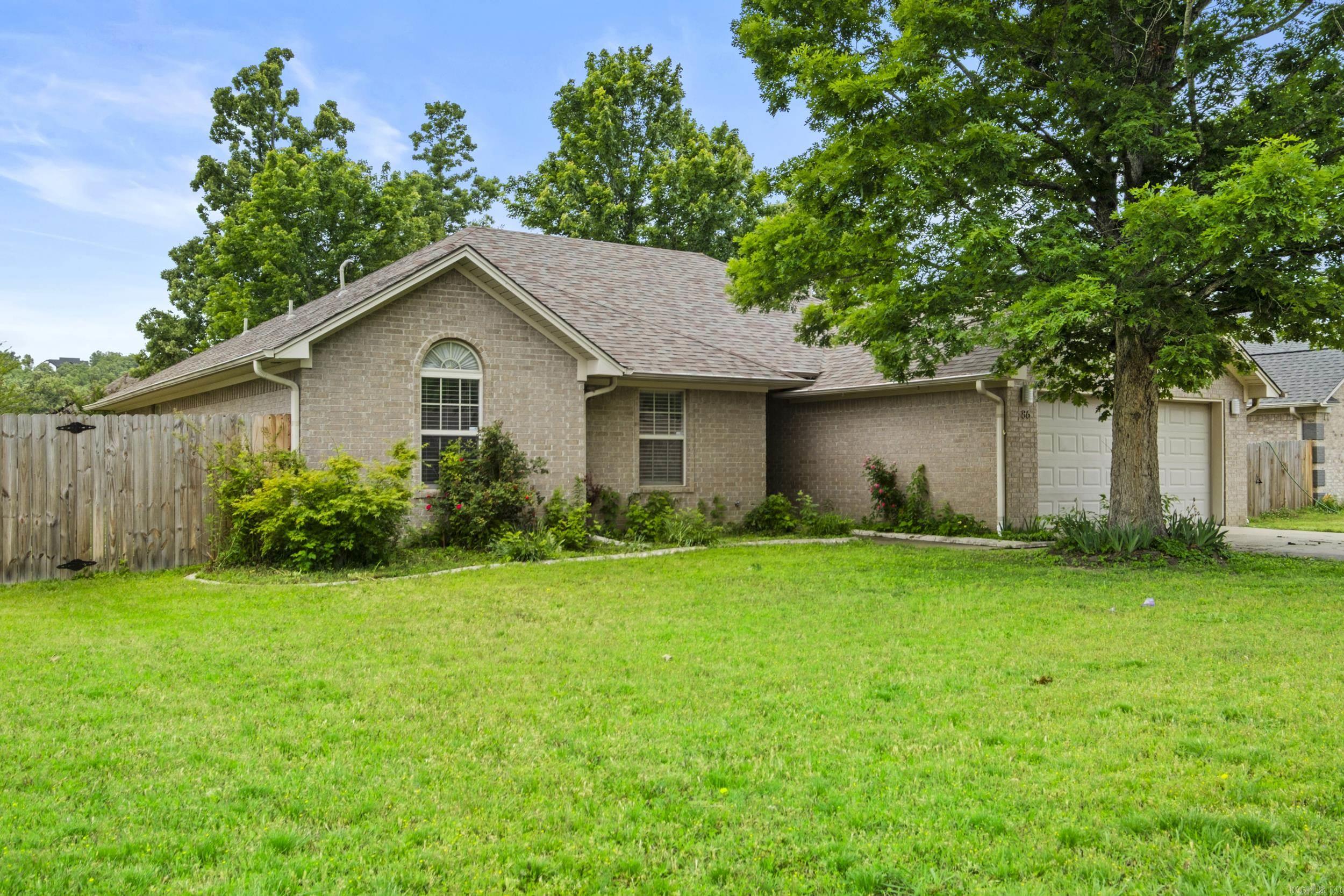 If you are looking for a great 3-bedroom, 2 full bath home with an amazing backyard, you have found it!  The fenced backyard with a covered back patio and additional larger patio makes the outdoors perfect for entertaining friends, relaxing, or playing with kids. Magness Creek Subdivision provides a community atmosphere with a tennis court, volleyball court, playground and lake. Indoors you will find nice, spacious bedrooms and a kitchen complete with granite countertops.  Come take a look at this one, and you will see what makes Magness Creek such a highly sought after place to call home!