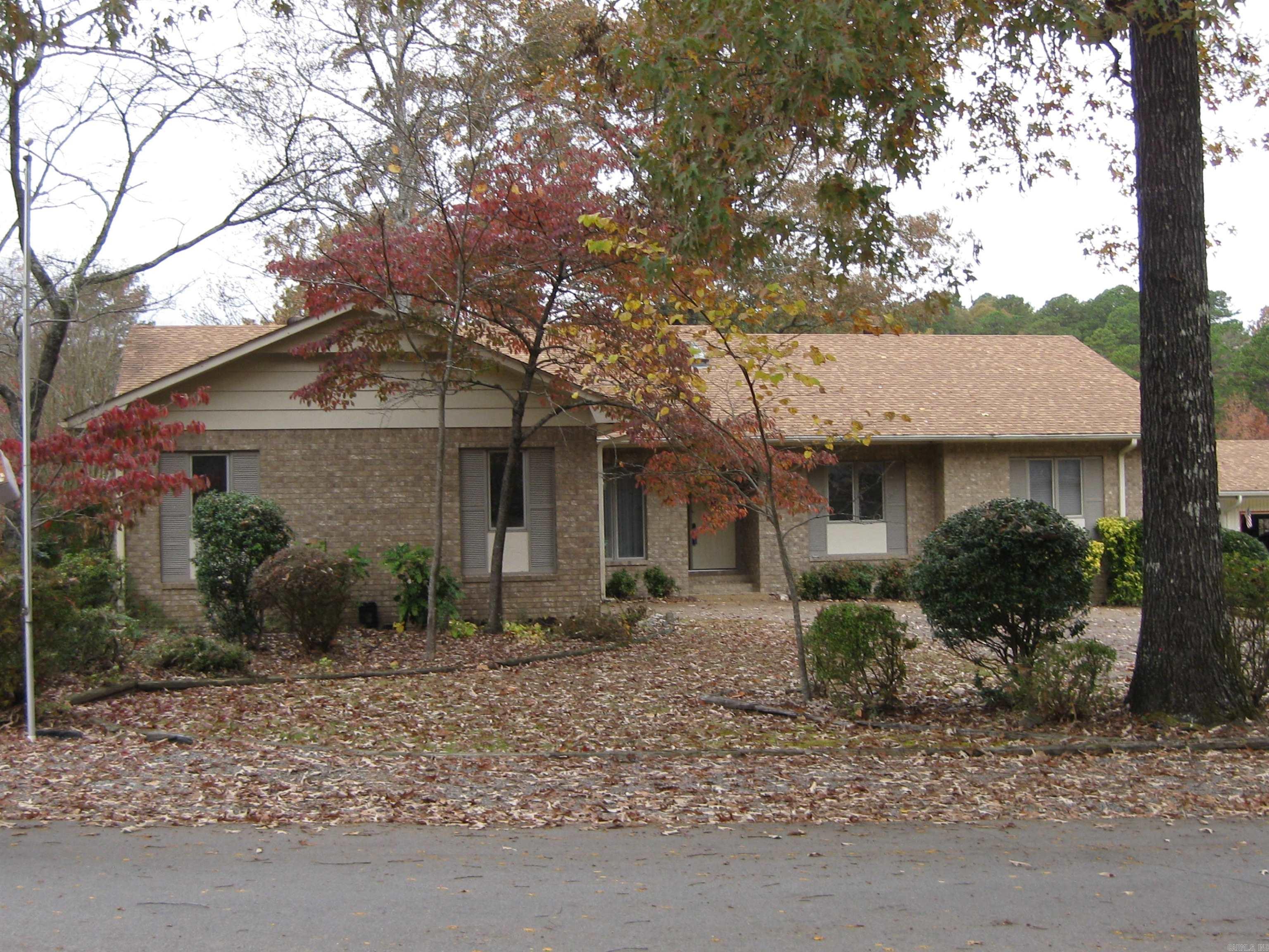 New Roof just added. Here is your chance to own an all-brick home on DeSoto Golf Course.  You can have beautiful views of the 12th Fairway, 12th hole and 13th tee box.  Large porch on back to enjoy. Ready to put your personal touches and remodel to your taste.  The 3rd bedroom could function as an office or a bedroom but there is no closet. There is a formal dining room that could also be utilized as another function.  There are 2 full baths with a 1/2 bath included in the utility room.  Come take a look. There is a $1,500 Buy-In fee for new members.