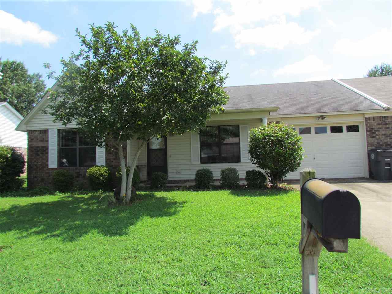 This little condo is a great way to downsize or a great investment property.  Conveniently located near banks, pharmacy, grocery stores & restaurants.  Fenced back yard, covered porch, garage w/opener, corian counter tops in kitchen, pantry, laundry room.  New HVAC 2013, new water heater this year.  Seller is having a new roof put on.