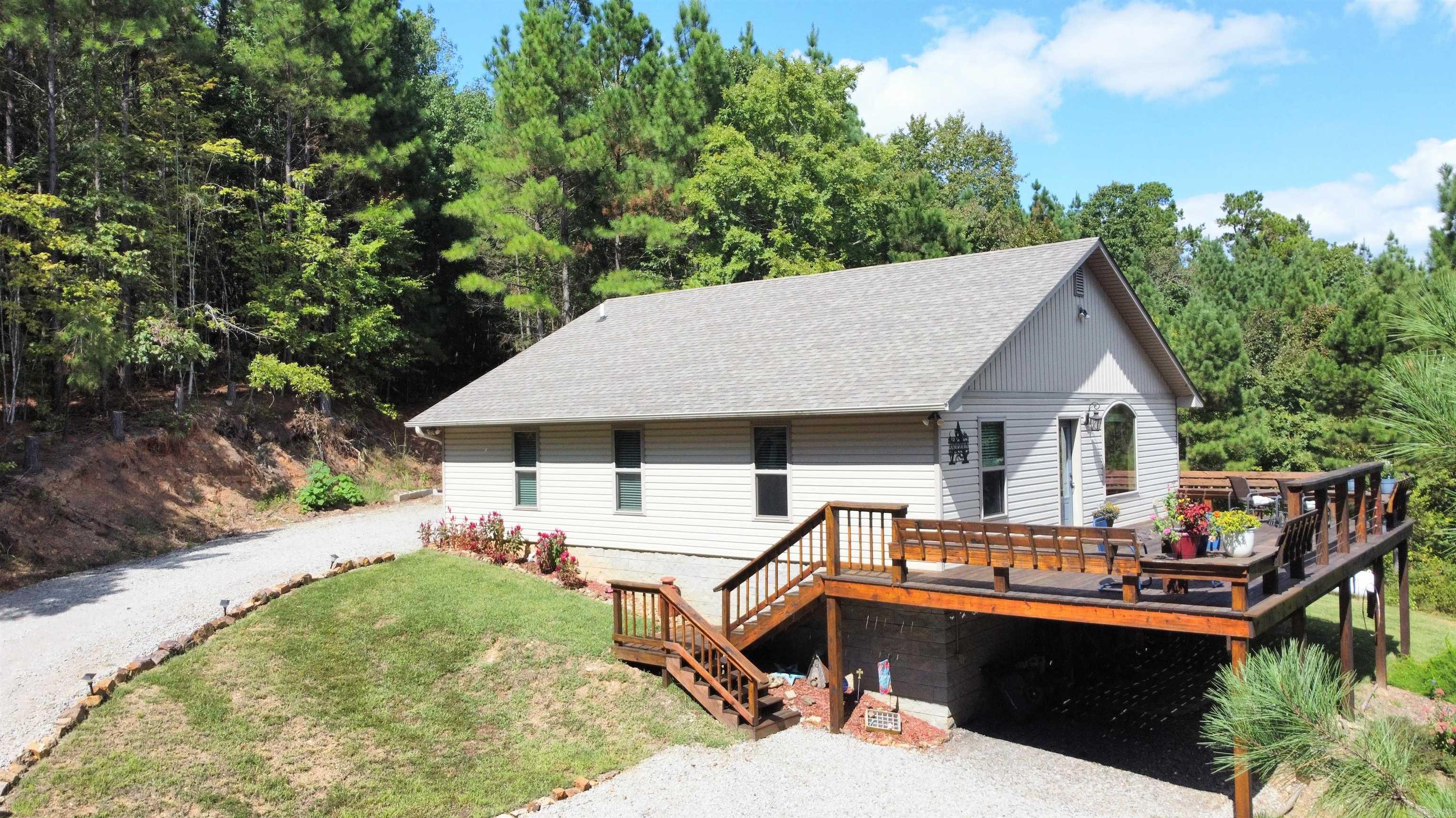 Escape to the country with this charming 2-bedroom, 2-bath home situated on 6.33 peaceful acres. Bordering the National Forest on one side, this property offers endless opportunities for outdoor adventure right at your doorstep. Inside, you’ll find a spacious kitchen perfect for gathering, a large living room, and plenty of room to relax. Step outside to a big deck with breathtaking scenic views, an ideal spot for morning coffee or evening sunsets. Whether you enjoy hunting, ATV trails, exploring creeks, or simply soaking in the quiet beauty of nature, this property has it all. Don’t miss your chance to own this slice of paradise, schedule your showing today!