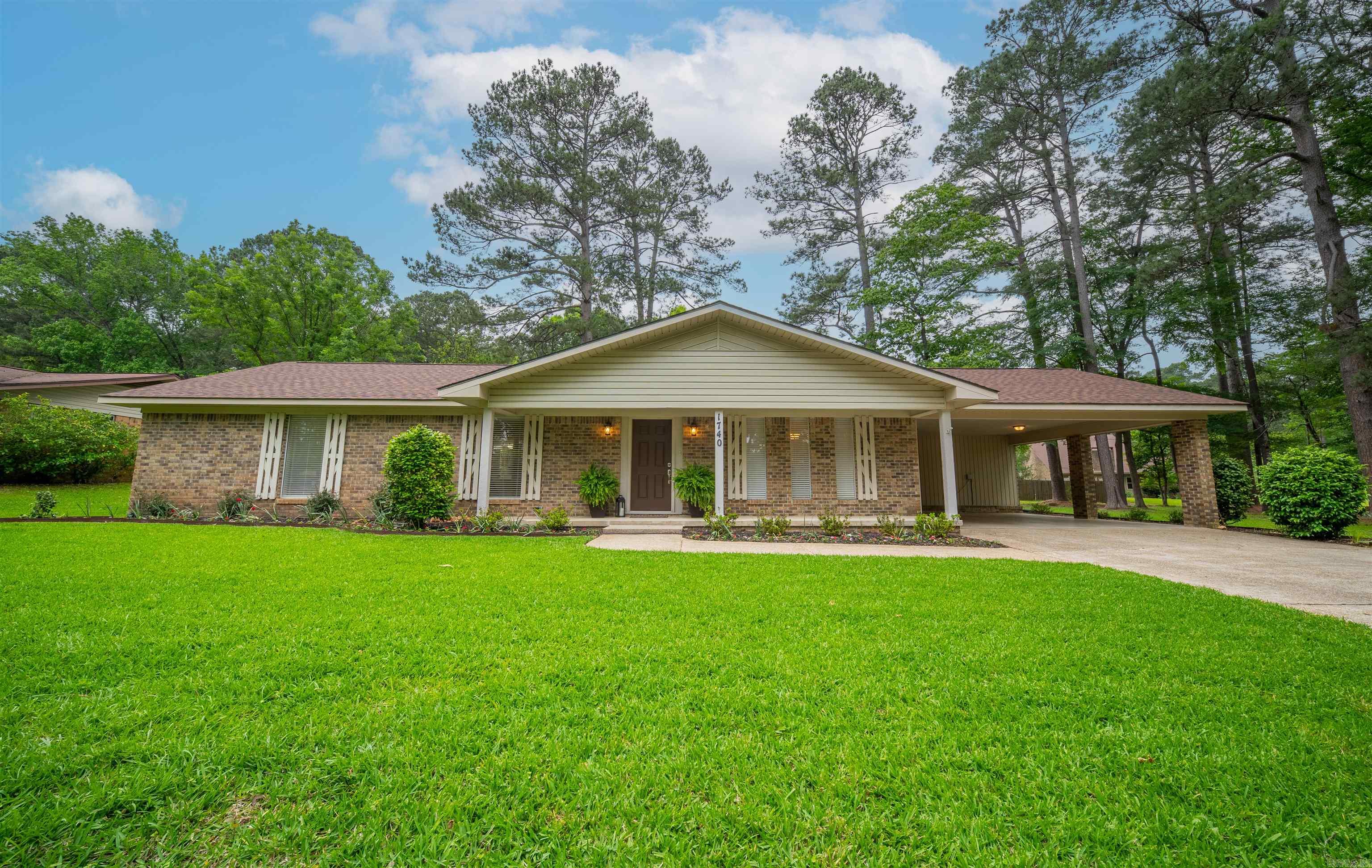 Located on Holly Hill in a highly sought-after subdivision known for its beautiful properties, this well-maintained 3-bedroom, 2 bath brick property offers space, function, and thoughtful updates throughout. Featuring an open living area plus an additional living space or dining space, office, dining area, there is room for everyone to spread out and enjoy. The home has been tastefully updated while maintaining its charm, and the beautifully landscaped yard is enhanced with a newly added sprinkler system for easy upkeep. Step outside to enjoy the spacious deck, perfect for grilling and entertaining, along with extra storage that adds even more convenience to this already impressive property.