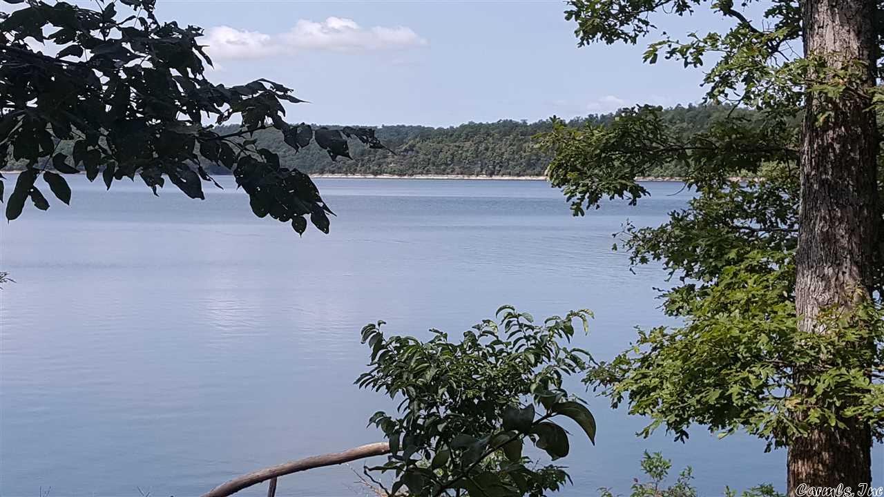 Lake access just below home sites, or keep all the beauty for yourself. Already divided into subdivision lots with clearing to show amazing year round views of Lake Norfork. Corps land borders the property. 120 AC M/L for $1,350,000.