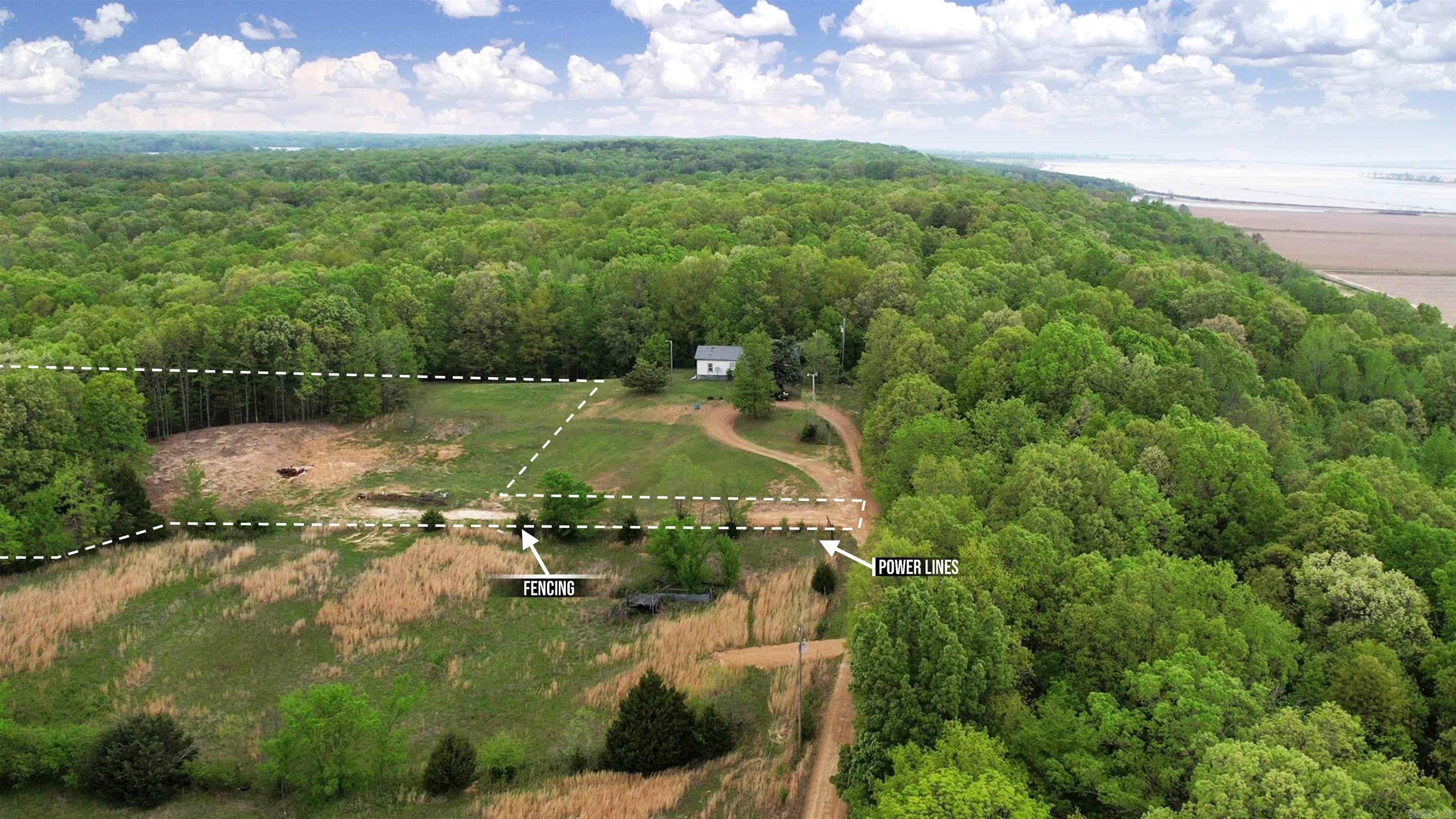 Welcome to Market Lot 9 of Distress Creek Rd in Harrisburg, AR! This lot includes 5.31+/- acres with no restrictions giving you the flexibility to create your dream setup, whether that’s a home, barndominium, shop, or recreational getaway. A driveway has already been added for easy access, and a portion of the land has been cleared, saving you time and money as you get started. Rural water is available to tie into, making utilities even more convenient. Enjoy peaceful country living while still being just approximately 5–7 miles from Lake Poinsett, offering quick access to fishing, boating, and outdoor recreation. Just 20 miles to Jonesboro and 60 miles to Memphis. If you’ve been looking for land with true flexibility and a head start on improvements, this is it. Call your favorite agent to schedule a tour today!