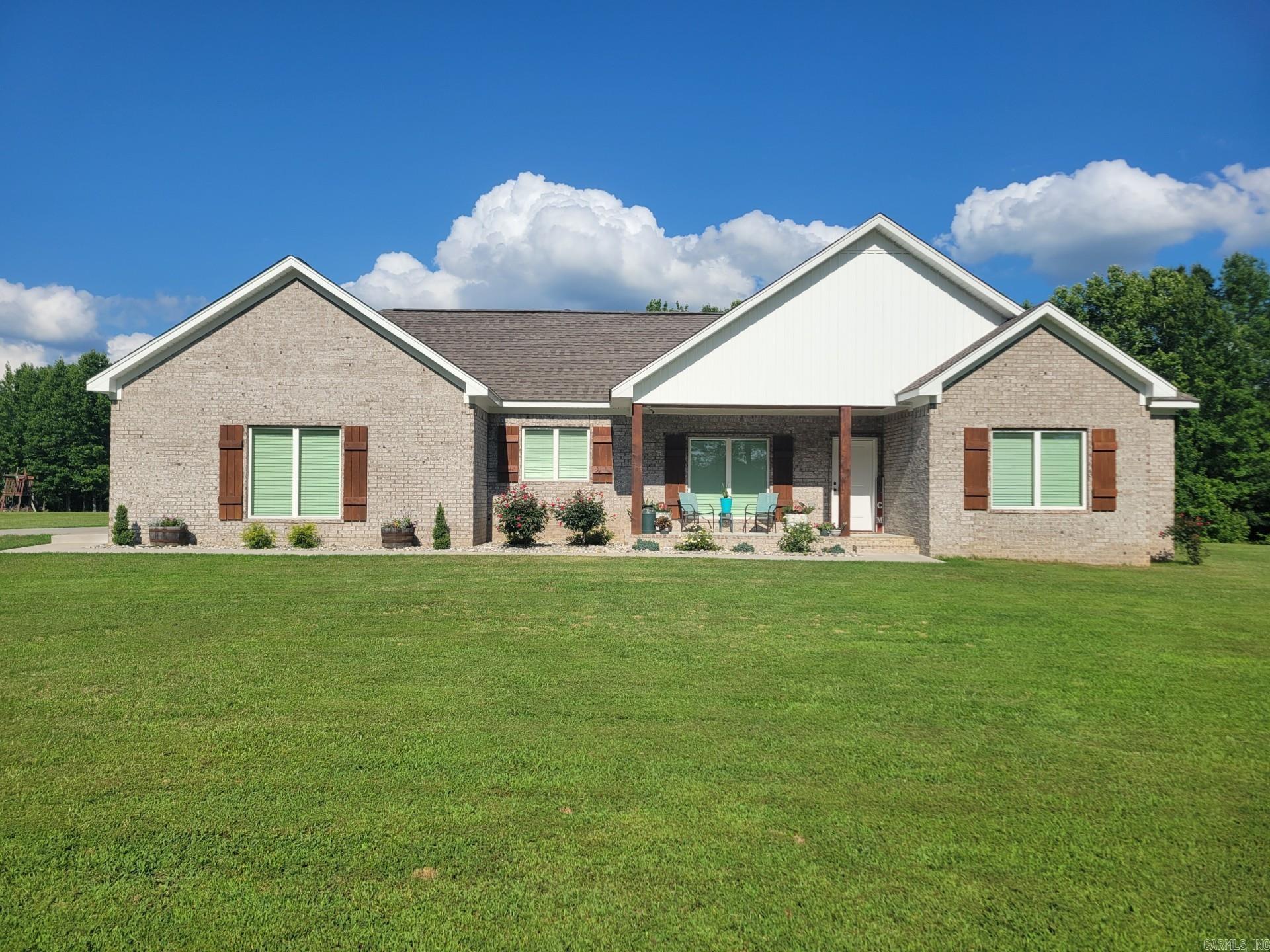 Experience privacy and tranquility in this beautiful, custom-built home nestled on a serene 1-acre lot. The open kitchen is a chef’s dream, featuring stunning cabinets, quartz countertops, and a separate island perfect for meal prep and entertaining.  The thoughtful split floor plan includes a primary suite with a large walk-in shower, offering a spa-like retreat. Just off the kitchen, a versatile room is currently set up as a private office—it could also serve as additional pantry space or storage.  Built for comfort and efficiency, the home features 2x6 walls for energy savings and a stand-alone pellet stove to keep you cozy during the fall and winter months.  Don’t miss your chance to enjoy country living in a home that feels like new—schedule your showing today!