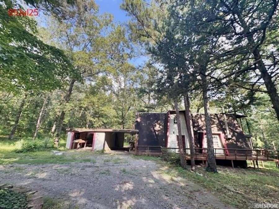 HEBER SPRINGS - $91,660! 3BR 2 full baths, bi-level 1658sf on almost an acre of land, offering massive decks/patio, Gambrel roof, close proximity to Little Red River for all your dreams/enjoyment/fishing & water sports!! large lot for privacy, garden spot, fencing for kids/pets, C-H/A (no inspections) - SOLD AS-IS -  “This property is subject to the Freddie Mac First Look Initiative. The Freddie Mac First Look Initiative limits offers from being entertained during the first 20 days of listing to owner occupant and non-profit buyers. Investor offers will be responded to after the first look period ends on 10/24/2025