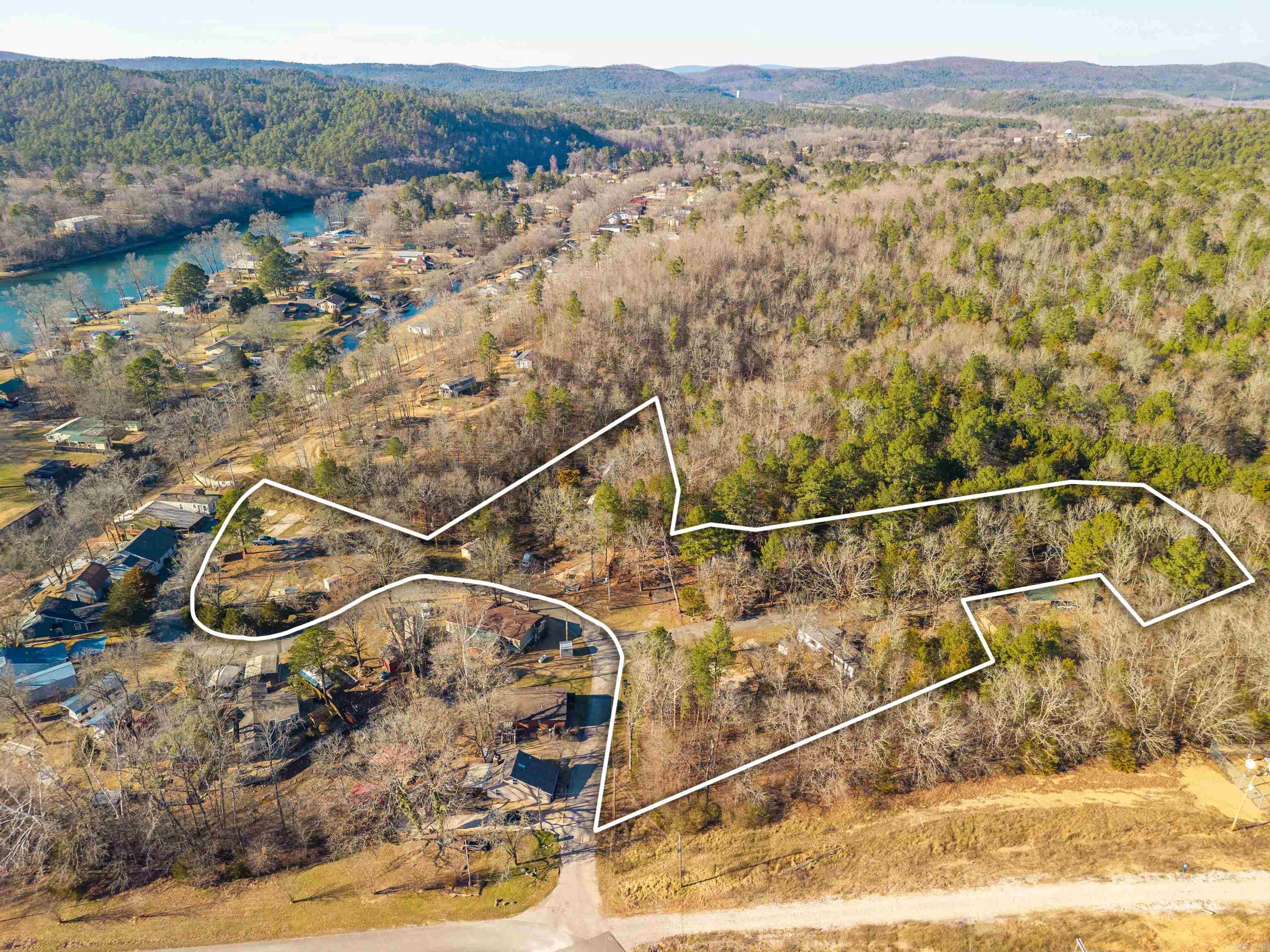 An excellent opportunity for investors and visionaries! This exceptional property features over 20 plus RV lots, ready to generate serious income potential. Imagine the possibilities with a turnkey setup that includes both city water and city sewer already in place no well-drilling adventures or septic surprises here! But wait, there's more than just business potential. This gem comes with coveted lake access, perfect for attracting outdoor enthusiasts and nature lovers year-round. The surrounding area offers beautiful parks like the nearby Avery Day Use Area, along with convenient shopping and pharmacy services just a short drive away. Nestled in the stunning Hot Springs region of Arkansas, this property combines natural beauty with practical infrastructure a rare find that checks all the boxes. Whether you're looking to build a thriving recreational vehicle park or hold for future development, this opportunity is knocking loudly. This property will include Lake Hamilton lot that makes convenient access. Don't let this one slip away schedule your showing today!