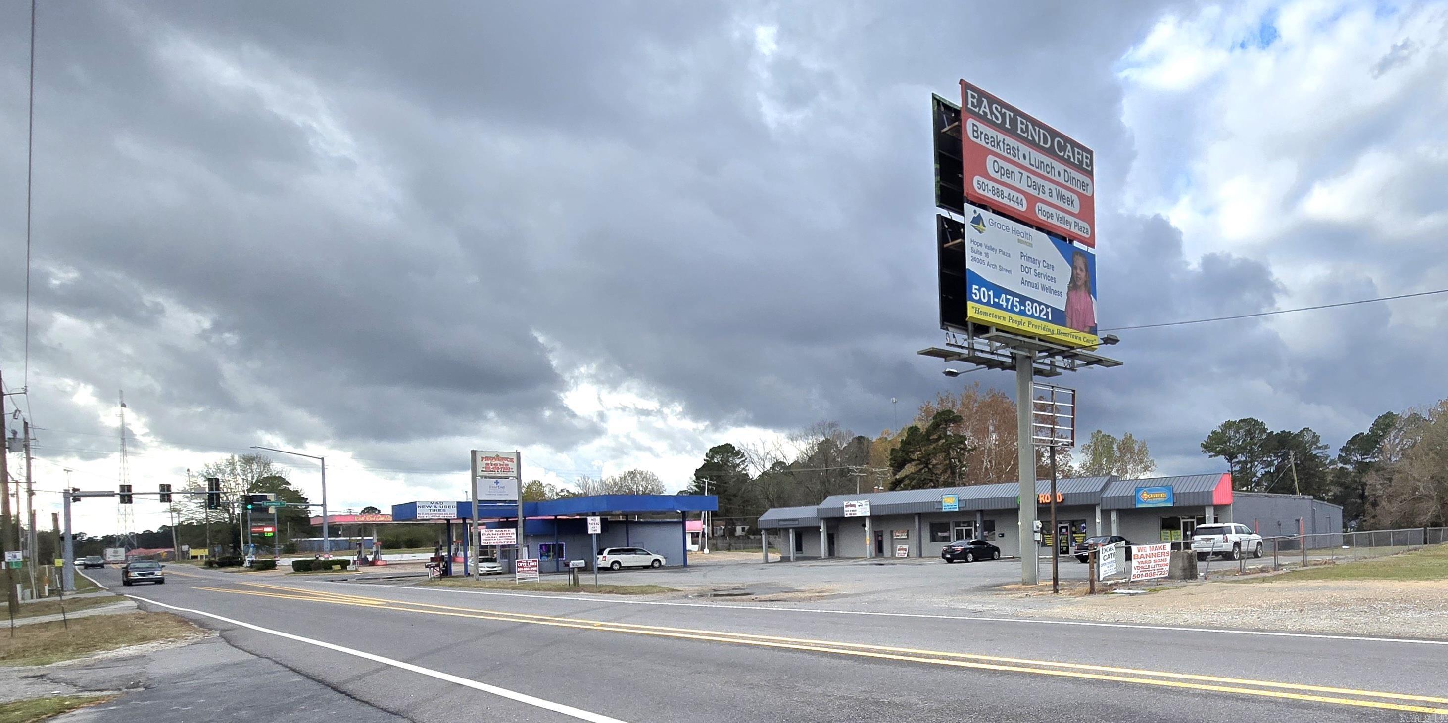 Renovated in 2020/2021 is fully occupied and per old appraisal it has 10520sf. Seller has changed their business but the property is completely rented and also has an annual advertising income. Located on the corner of Arch Street Pike and Sawmill Road. Property has entrance from Arch Street Pike and Sawmill.  Total monthly income $3,850, seller pays for water, and lawn care.  Trash expense goes to the tenants.  Please do not disturb the current tenants.