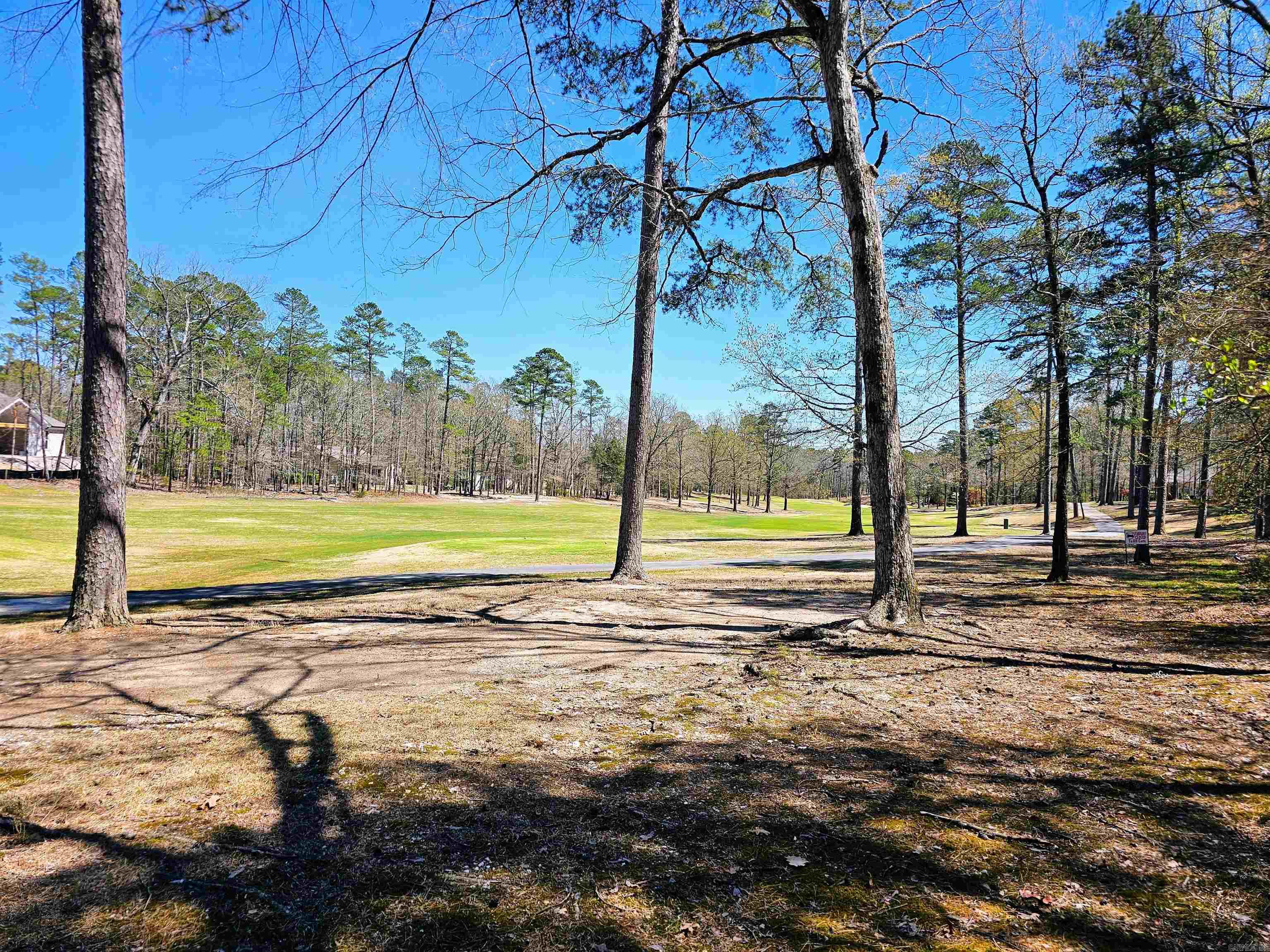 East End golf course lot located on the 1st hole of Ponce Golf Course.  Hot Springs Village is a gated community with 9 golf courses; 12 lakes; 30+ miles of walking trails; state of the art fitness center; tennis complex; indoor/outdoor pickbleball courts; and outdoor pool.  Come see all that the Village has to offer!  Photos 5-17 are photos around Hot Springs Village. First time buyers to Hot Springs Village are subject to a one time Buy In Fee of $300.00 payable to HSV POA payable at Closing.  When lot is developed, an additional fee of $1,700.00 will be collected. Agents See Remarks
