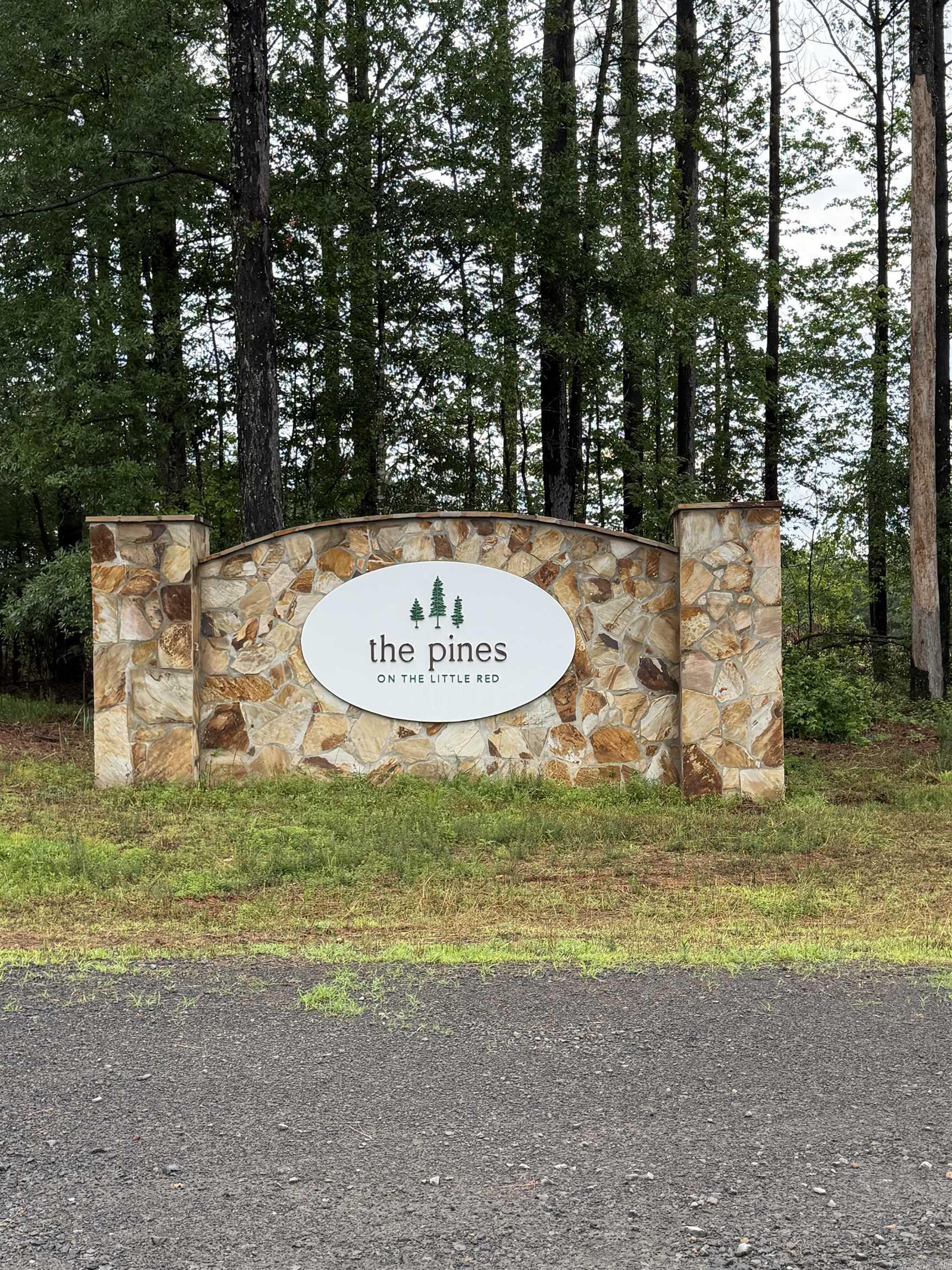 these lots are separated buy road but are being sold together. This subdivision has a private gated boat ramp into the Little Red River Lot 10 is waterfront. I have a copy of the restrictions on hand, No mobile homes allowed