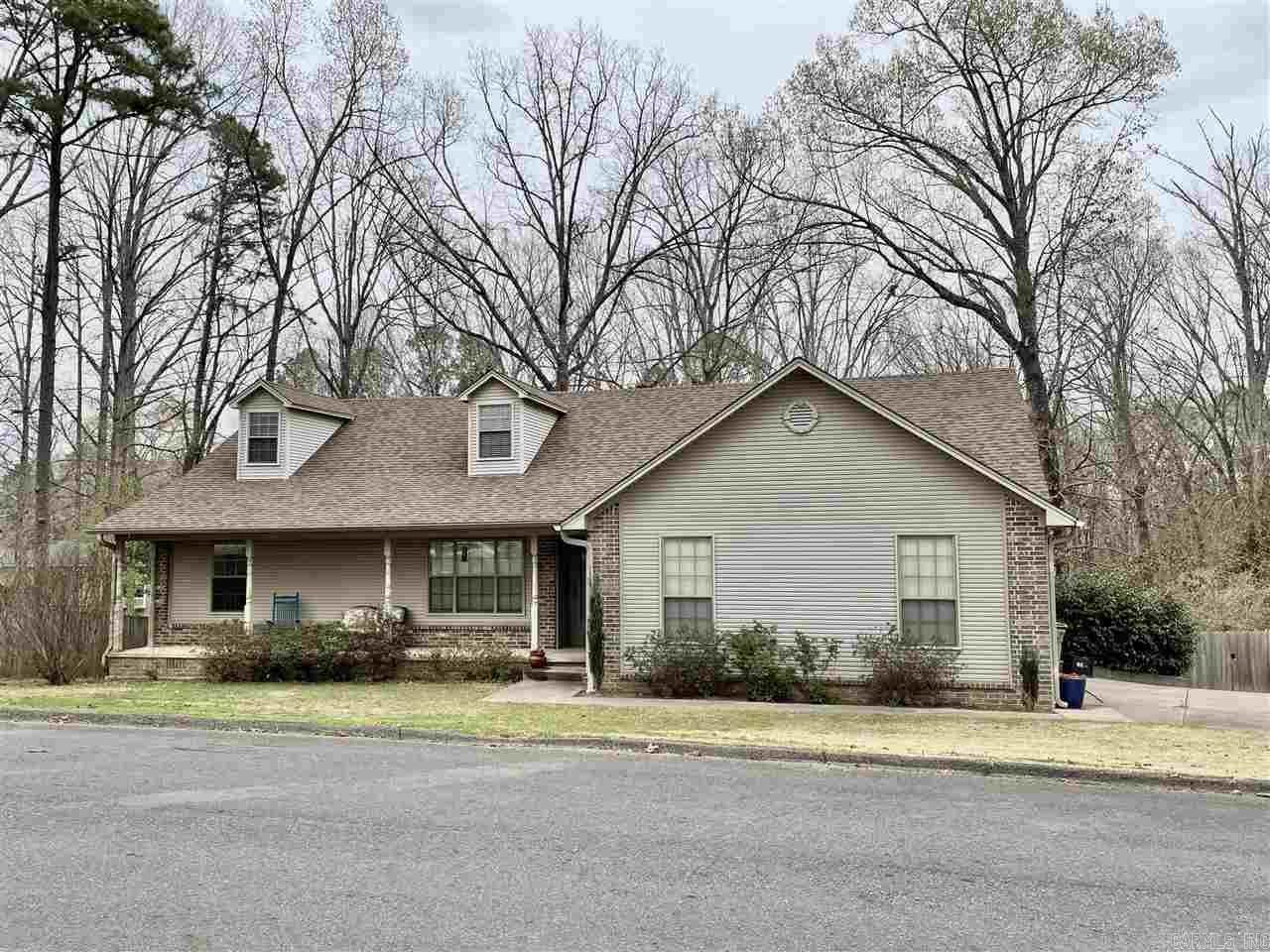 Move in ready home in established neighborhood. NEW ROOF in 2019. Beautiful NEW hardwoods in living and master. Gas log fireplace. Large kitchen with lots of cabinets. Amazing master suite with double sinks, walk in shower, jet tub and LARGE walk in closet. Built in vanity/desk in master. 2 nice sized bedrooms split from master with NEW carpet. About 250 sq ft basement, heated and cooled (not counted in sq ft). Outdoor oasis with deck, gazebo, trees and its fully fenced. YOU will not want to miss this one!