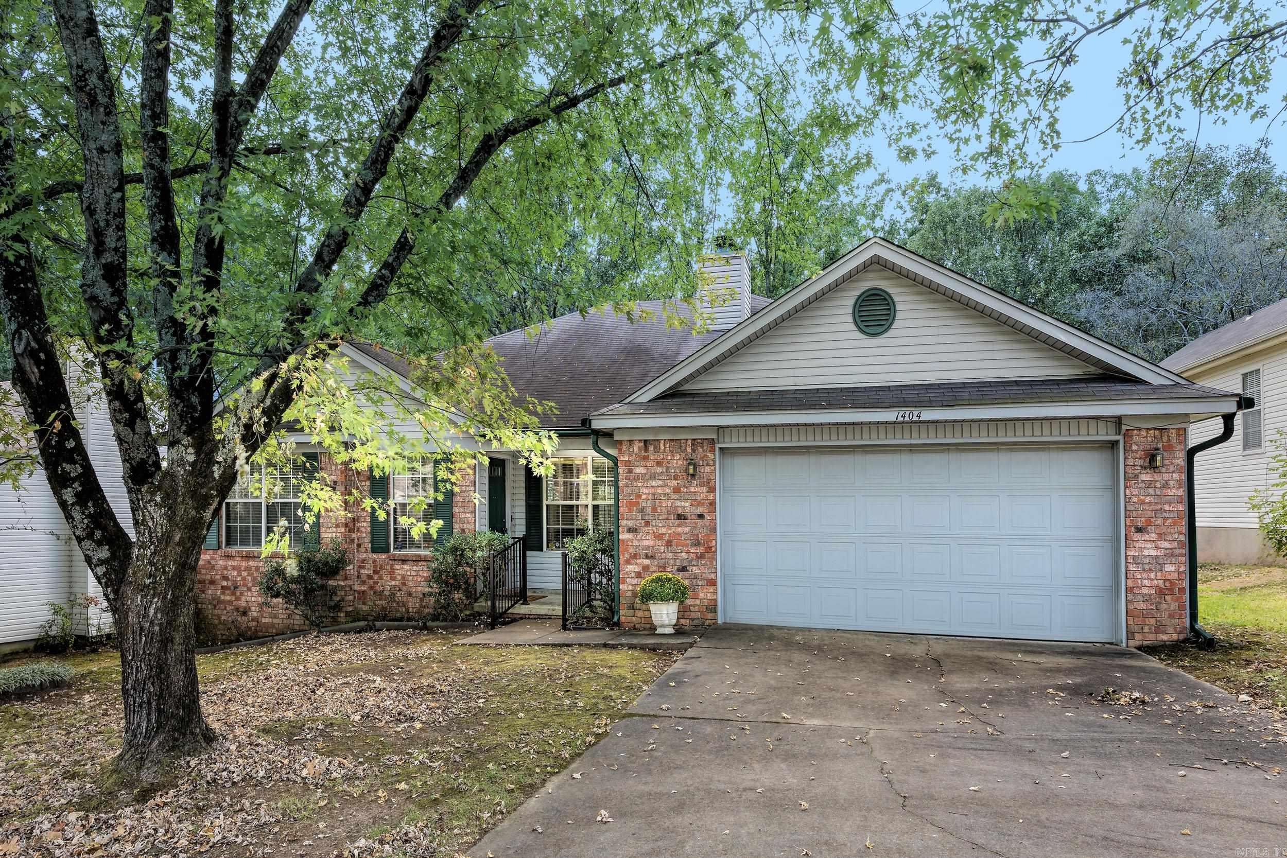 Step through the front door of this 3bd/2ba home into a well-lit and inviting living space, featuring a vaulted ceiling, gas fireplace and large windows that fill the rooms with natural light. Built in 1992, this home offers an open design, split bedroom floorplan and numerous upgrades including a home generator, a walk-in-tub, soaking tub, gutters and an accesiblility ramp. The spacious u-shaped kitchen has ample storage and outdoor access for morning coffee on the deck.  The master suite provides a peaceful retreat with its generous size, en-suite bathroom, and walk-in closet. The backyard offers a private sanctuary with a garden and partially covered deck, perfect for enjoying outdoor gatherings. Conveniently located in West Little Rock between Bowman and Kanis.