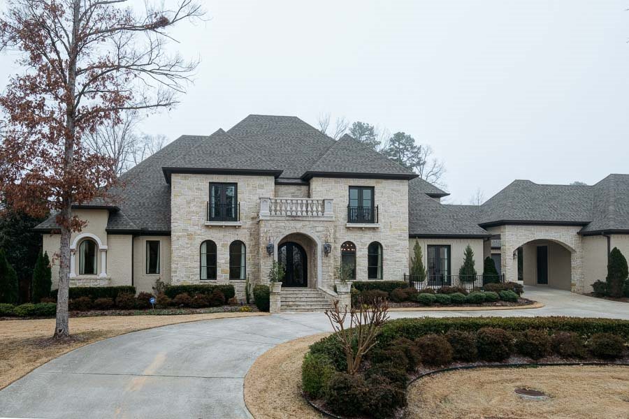 This custom home, offers the best of timeless architecture, with a modern spin. Set on an oversized corner lot (.85 acre) allows a large yard for privacy and entertaining. Integrating aspects of the home reflects attention to detail and creates the fluid sense of sophistication. The main level features Formal & Informal entertaining areas, Study, Media Room, Master & Guest suites. Upstairs has 3 family bedroom suites and two living areas. Additional features include large covered porches and a 5 car garage.