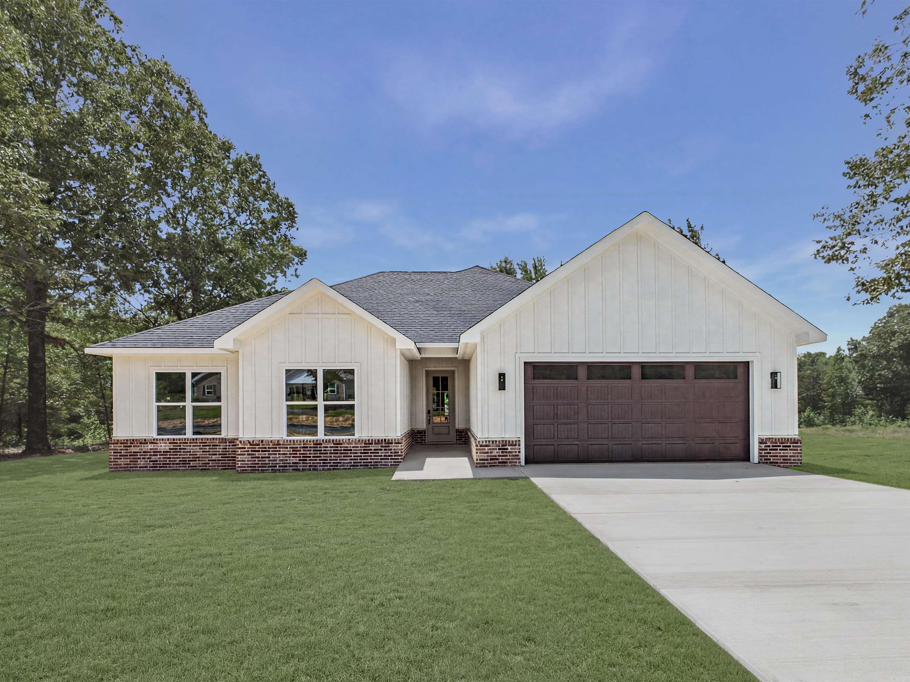 This NEW CONSTRUCTION Hardi Plank and Brick!  Beautifully appointed 3 bed, 2 bath home blends style and comfort with an open layout. Tall ceilings, beautiful trim work lvp throughout and a STUNNING statement fireplace wall. The kitchen shines with quartz countertops, pantry, ss appliances and modern appeal, The primary bath includes a gorgeous tile shower, vessel tub and so much more. Enjoy mornings on the back porch and evenings in the large backyard—perfect for making memories. This one is BEAUTIFUL! Must See!  ** See remarks**