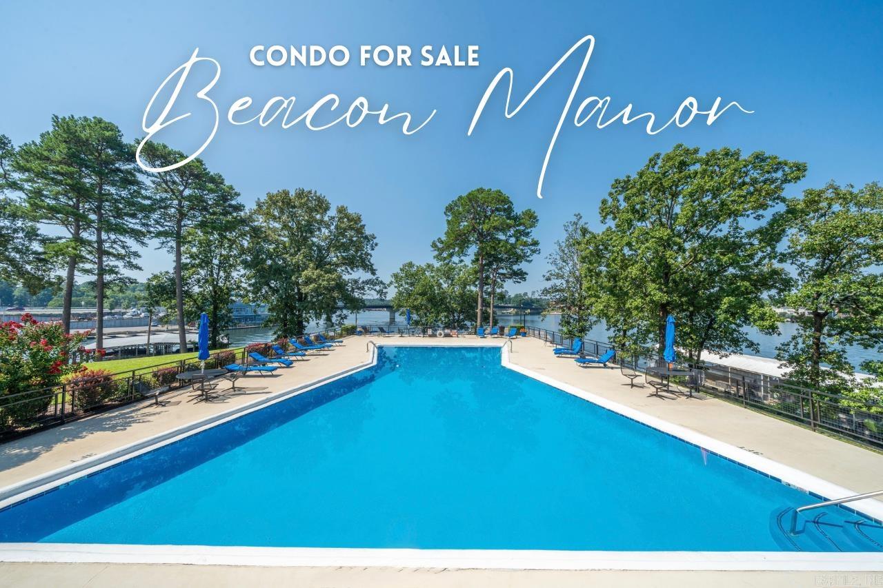 Lake Hamilton condo investment opportunity in Beacon Manor. This updated 1-bedroom, 1-bath residence offers lake views, an updated kitchen, covered parking, and access to gated waterfront amenities including a lakeside pool, tennis and pickleball courts, boardwalk access, and on-site management.  Nightly rentals are permitted, making this an ideal option for short-term rental income, a weekend retreat, or low-maintenance full-time living. Conveniently located near Oaklawn, shopping, dining, and entertainment, this property offers an appealing blend of waterfront lifestyle, flexibility, and investment potential.