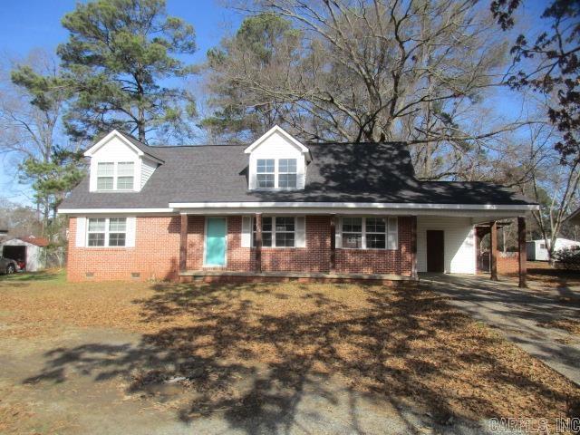 This 2 story home has so much potential!! 4 bedrooms, 2 bath home 2 bedrooms downstairs, 2 bedrooms upstairs. This home has hardwood floors. Upstairs the carpet has been removed and wood floor is ready to be refinished. Home still needs some trim work, base boards etc. These finishing touches will make this your new home. Shop in back yard is wired for electricity, for a workshop or man cave.  Fenced backyard, back patio.  Call today for your personal tour.