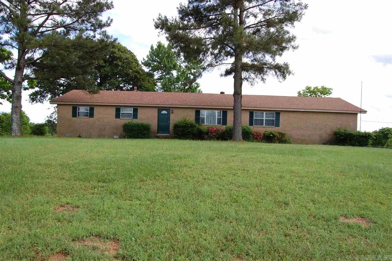 Awesome All Brick Home on approx. 1 acre with 2 living areas.  3 bedroom, 2 bath.  Large kitchen with breakfast bar and breakfast table area.  Formal dining/living combo. Laundry Room.  Two car carport that could easily be turned into closed garage with door.  Nice patio off the back of home and storage building. Newer roof and AC/heat units.  Schedule your showing today!