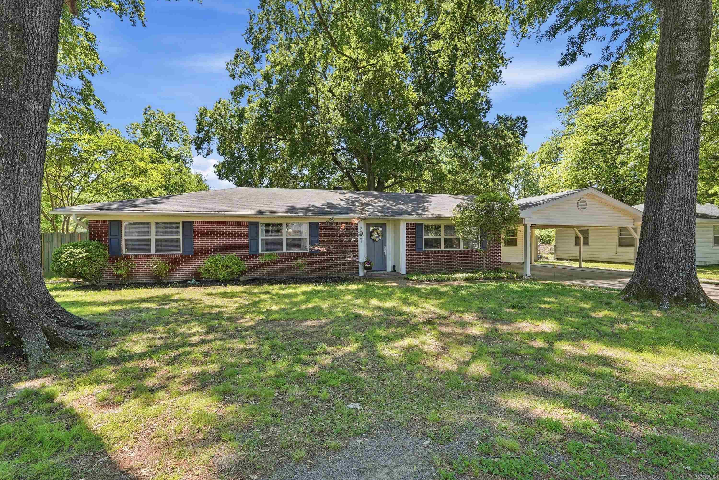 Beautifully remodeled and full of charm, this home offers the perfect blend of modern updates and comfortable living spaces. Inside, you’ll find stylish finishes throughout, an updated kitchen with a large island and abundant cabinetry, plus two separate living areas that provide flexibility for entertaining, relaxing, or a playroom setup. A dedicated office and convenient mud room add extra functionality for everyday living. The spacious primary suite features a beautifully updated bathroom, while the additional bedrooms offer plenty of natural light and character. Step outside to a park-like backyard complete with mature shade trees, a covered patio, and plenty of space to unwind or entertain. Conveniently located in the heart of Conway and move-in ready, this one is a must-see!