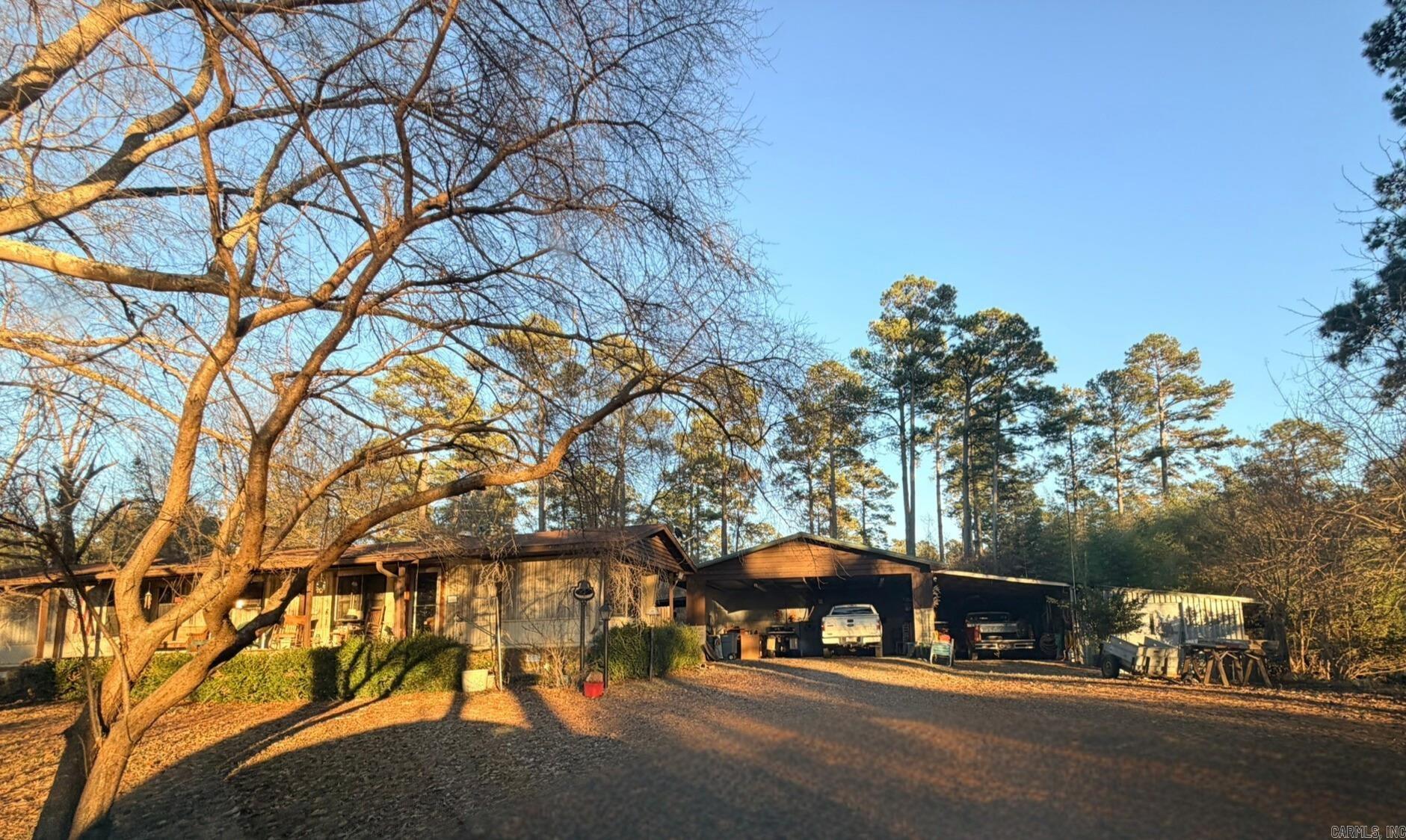 Spacious residence with 1,515 square feet of comfortable, move-in ready space ideal for full-time residence or weekend retreats. In a serene, quiet lake-area location with easy access to outdoor recreation and local amenities. Lot size, acreage, and square footage taken from courthouse records.