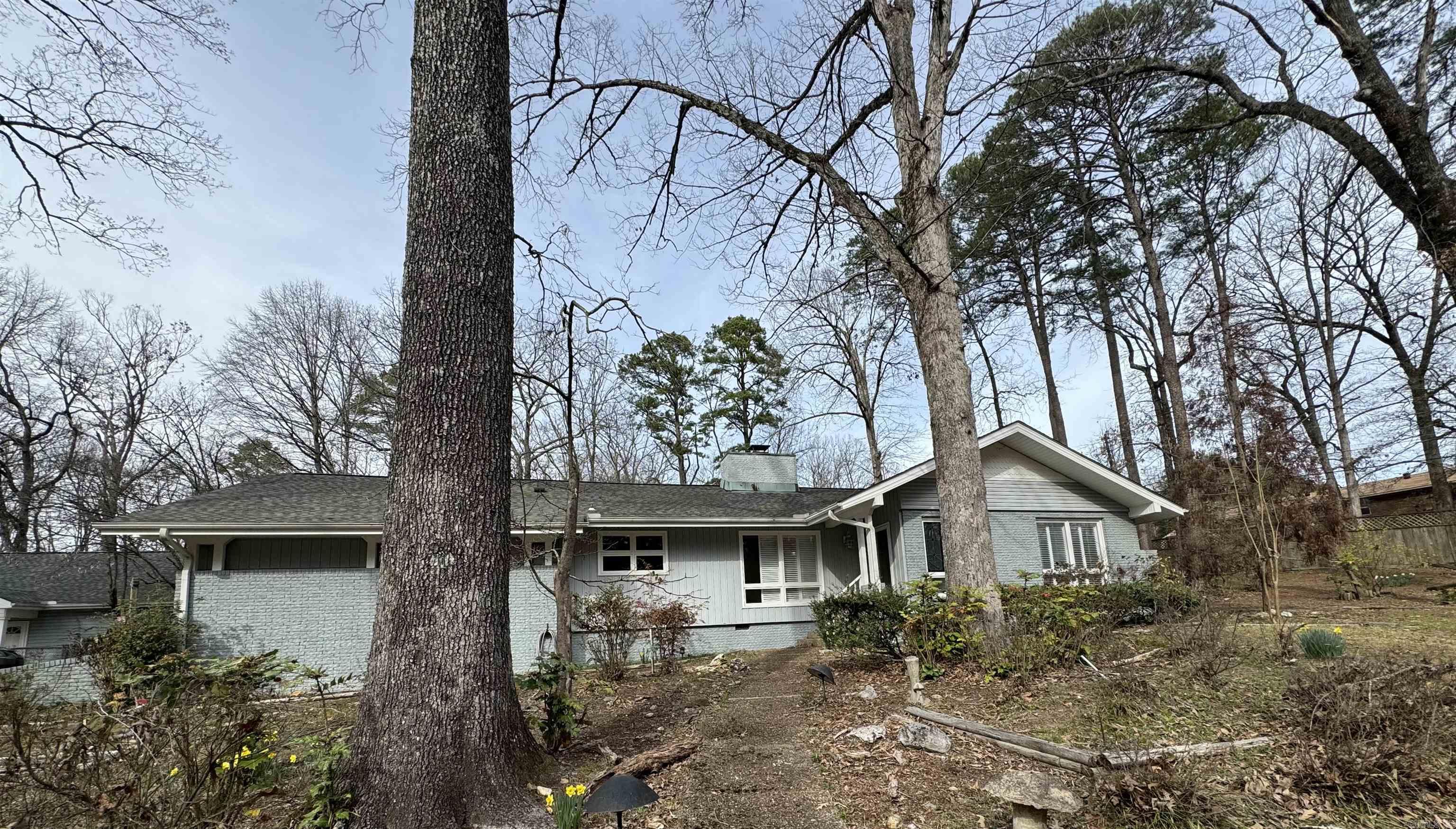 Beautiful 3 bedroom, 3 bathroom home with a guest house on a 1.67 acre lot.